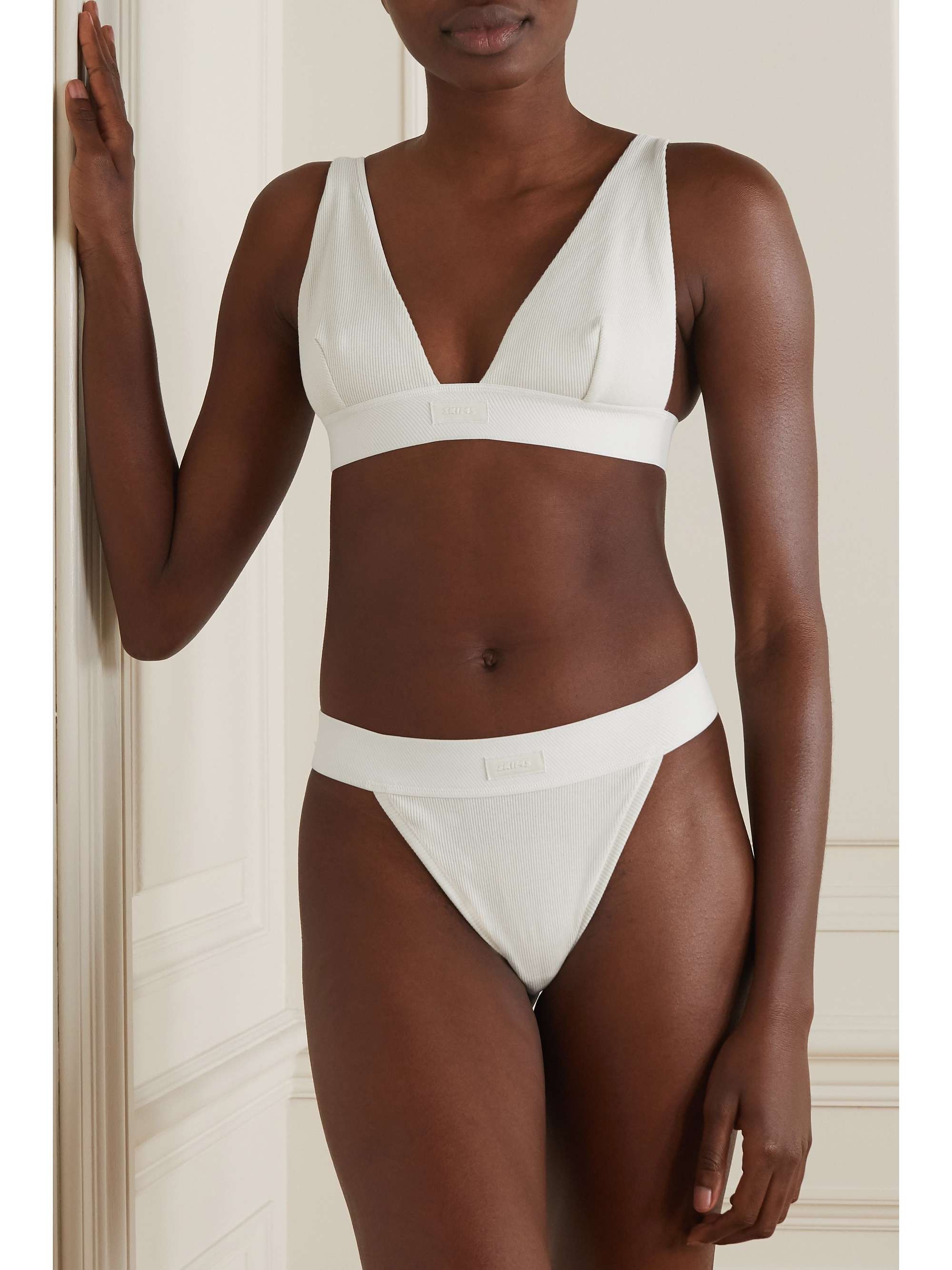 SKIMS Cotton Collection ribbed cotton-blend jersey thong - Soot