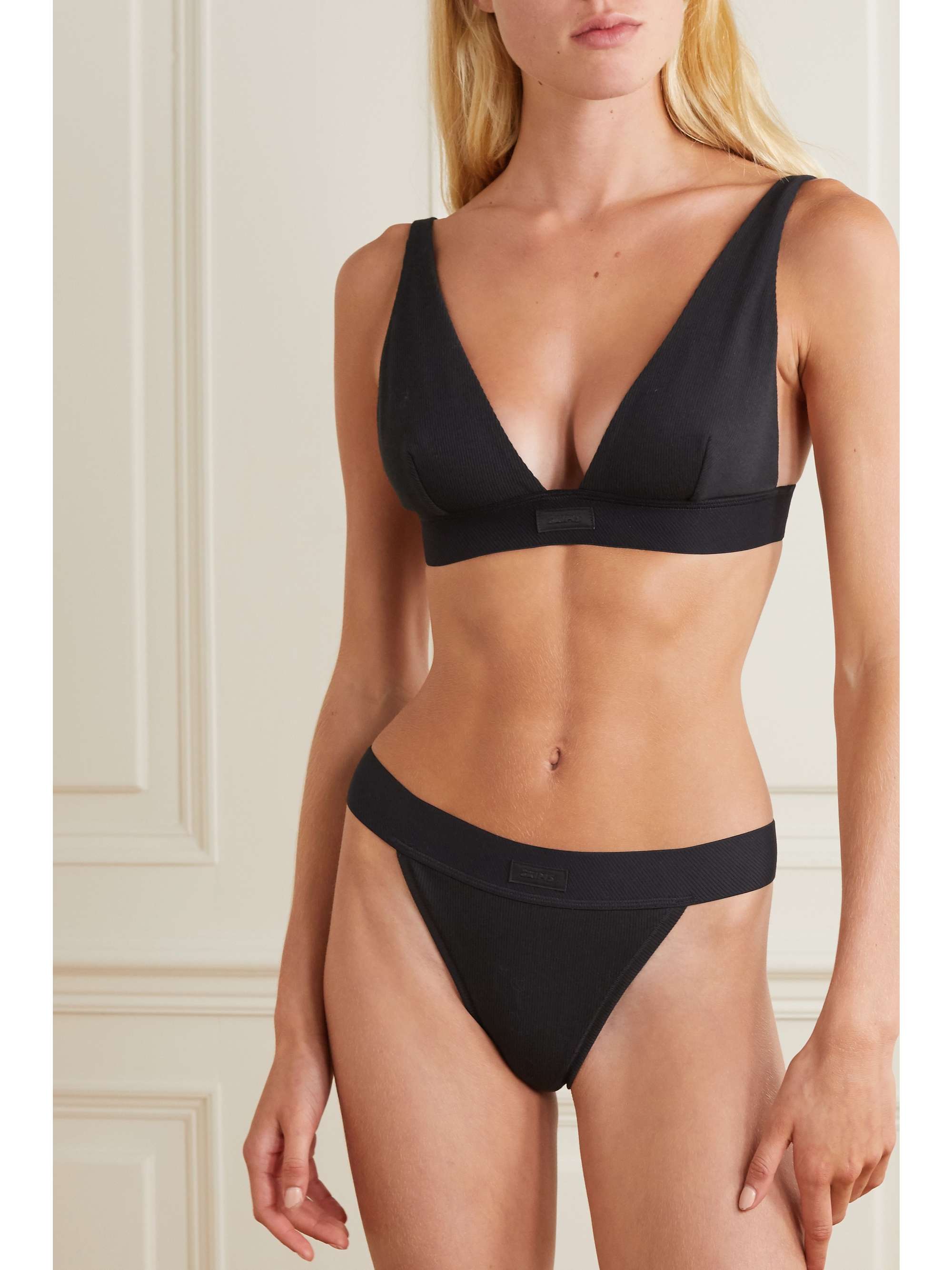 SKIMS Cotton Collection ribbed cotton-blend jersey thong - Soot