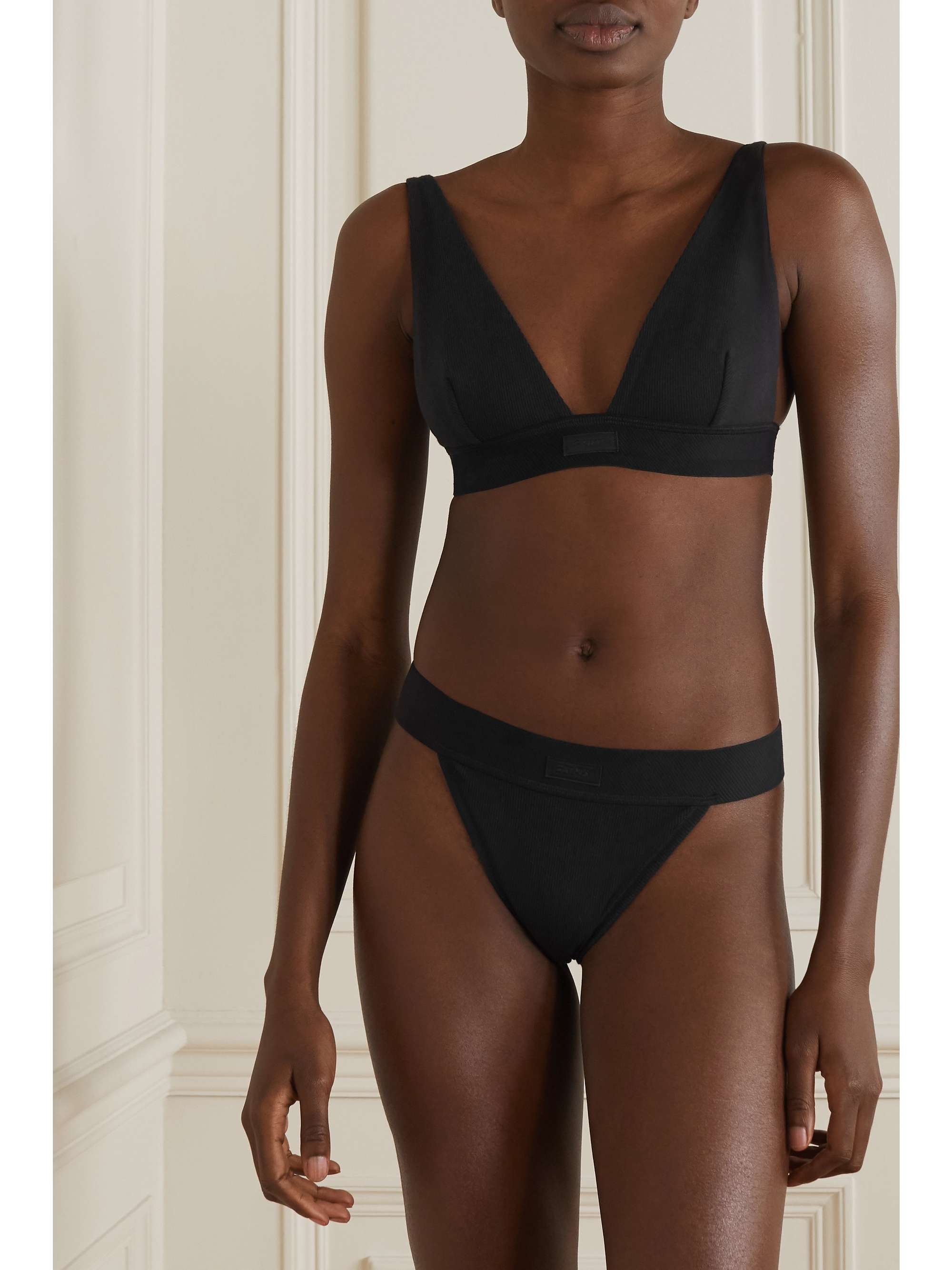 SKIMS Cotton Collection ribbed cotton-blend jersey thong - Soot
