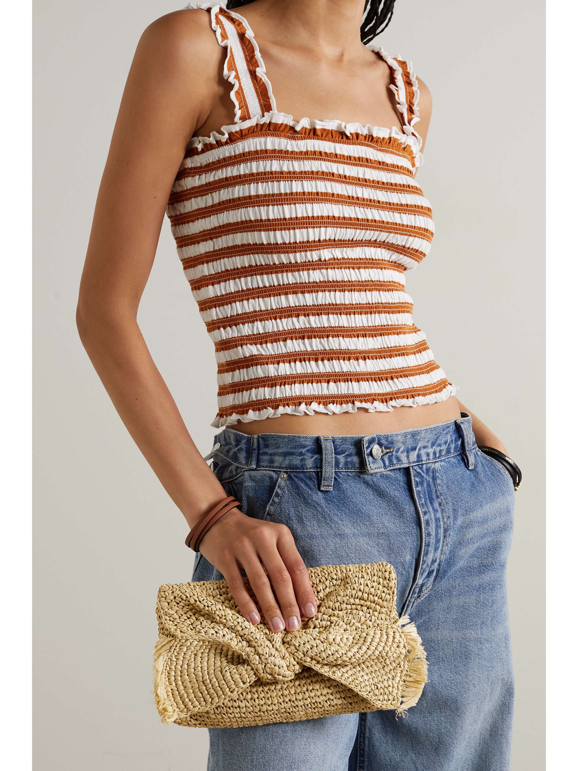 ANYA HINDMARCH Bow fringed raffia clutch
