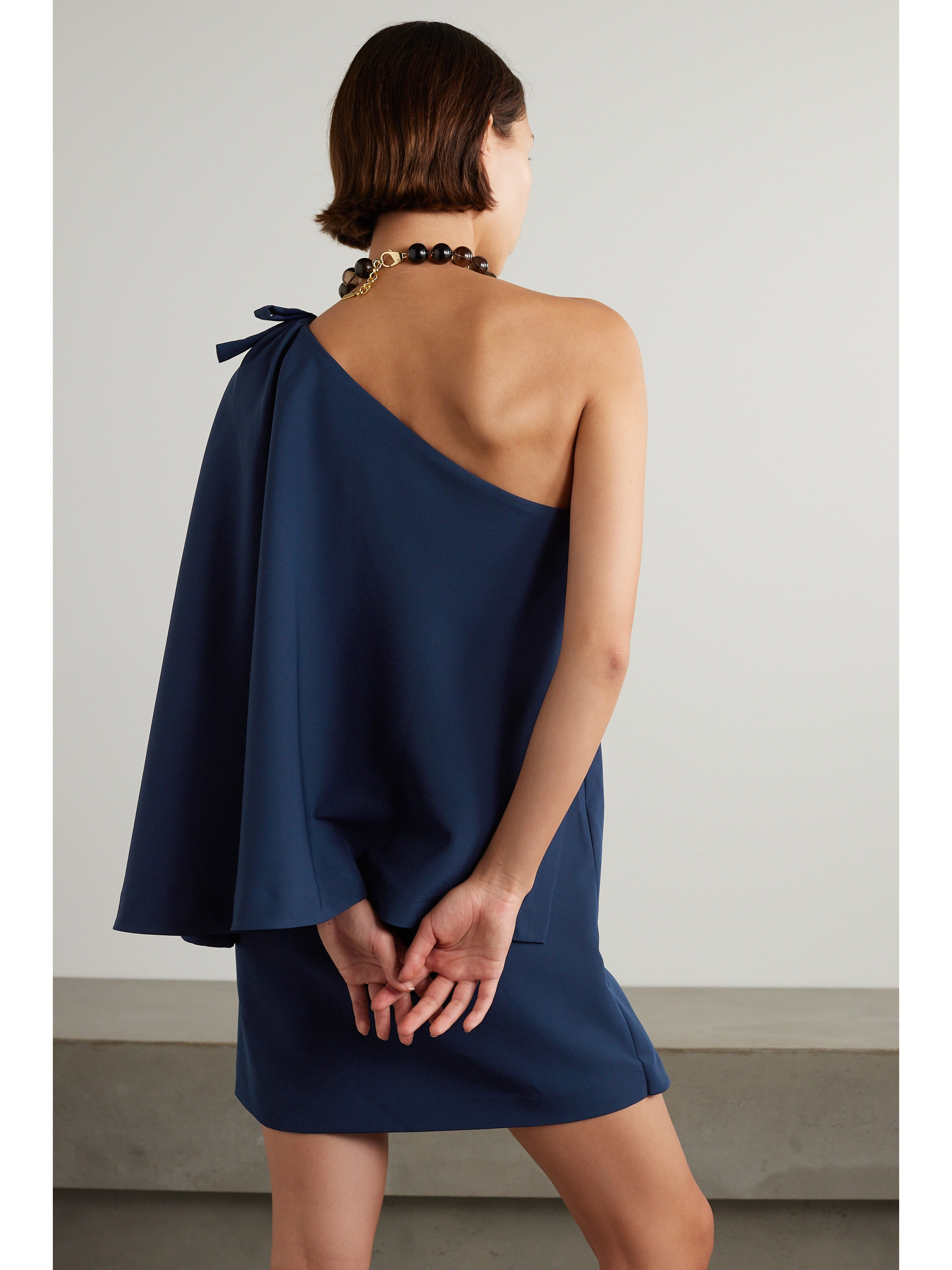 Bernadette Benedicte one-shoulder bow-embellished stretch-crepe mini dress