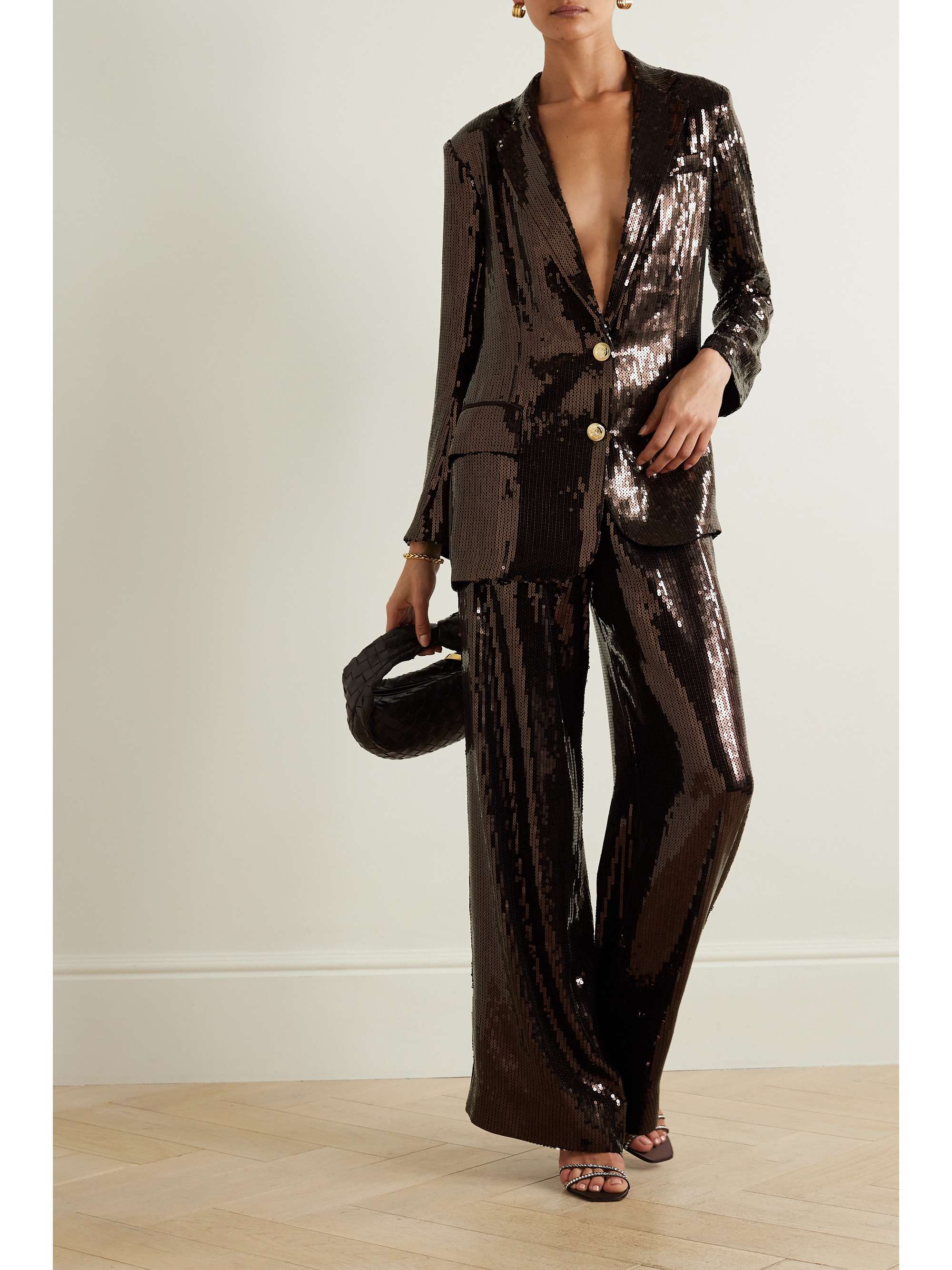 Retrofête's 'Trinity' pants are made from sequined crepe with sweeping wide legs, so they catch the light when you move. While the 'Dark Chocolate' hue will go with many other neutrals, we think it looks especially chic with the matching blazer (you can find it in our edit).