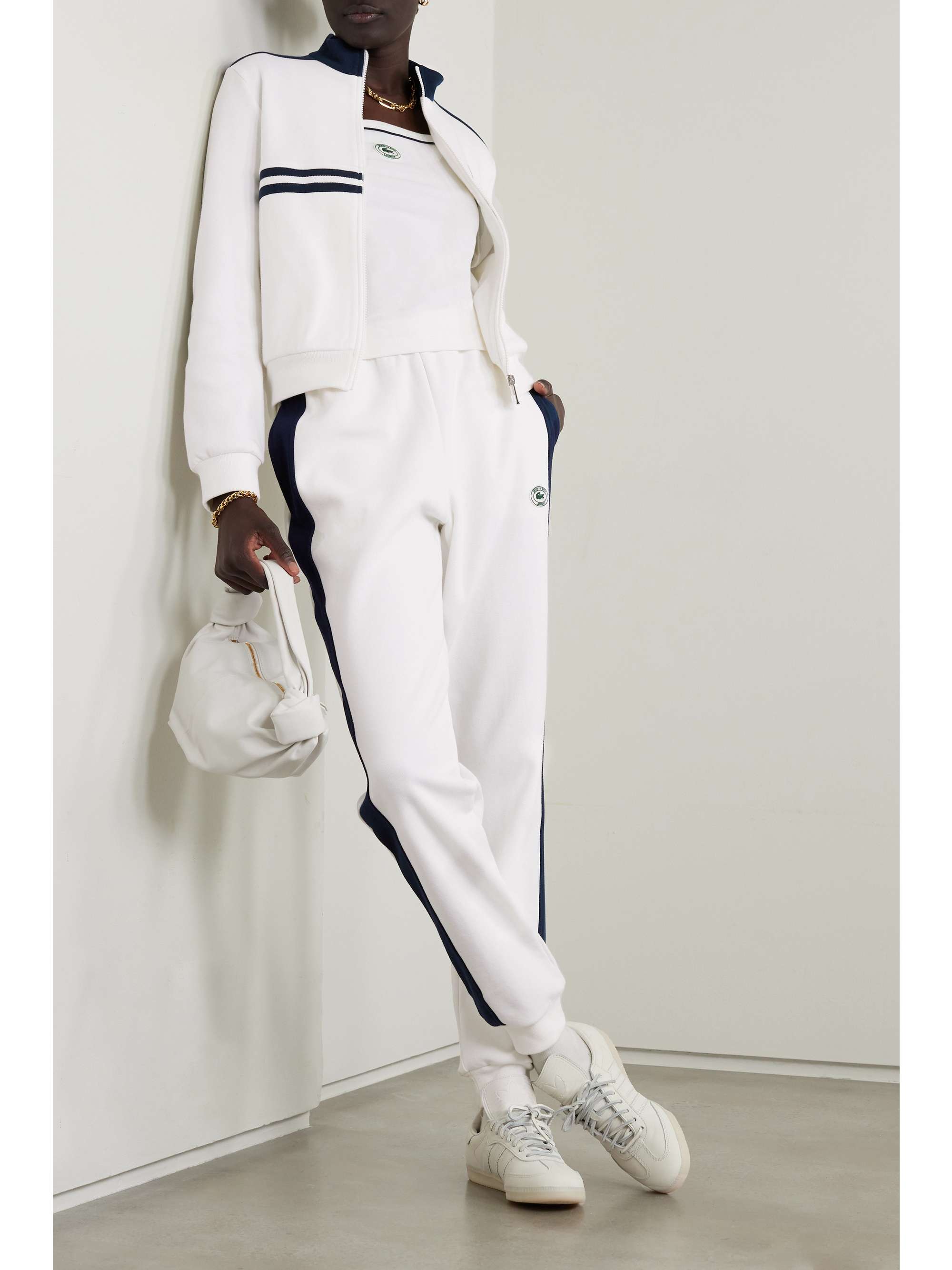 SPORTY & RICH + Lacoste striped cotton-blend piqué track pants |  NET-A-PORTER