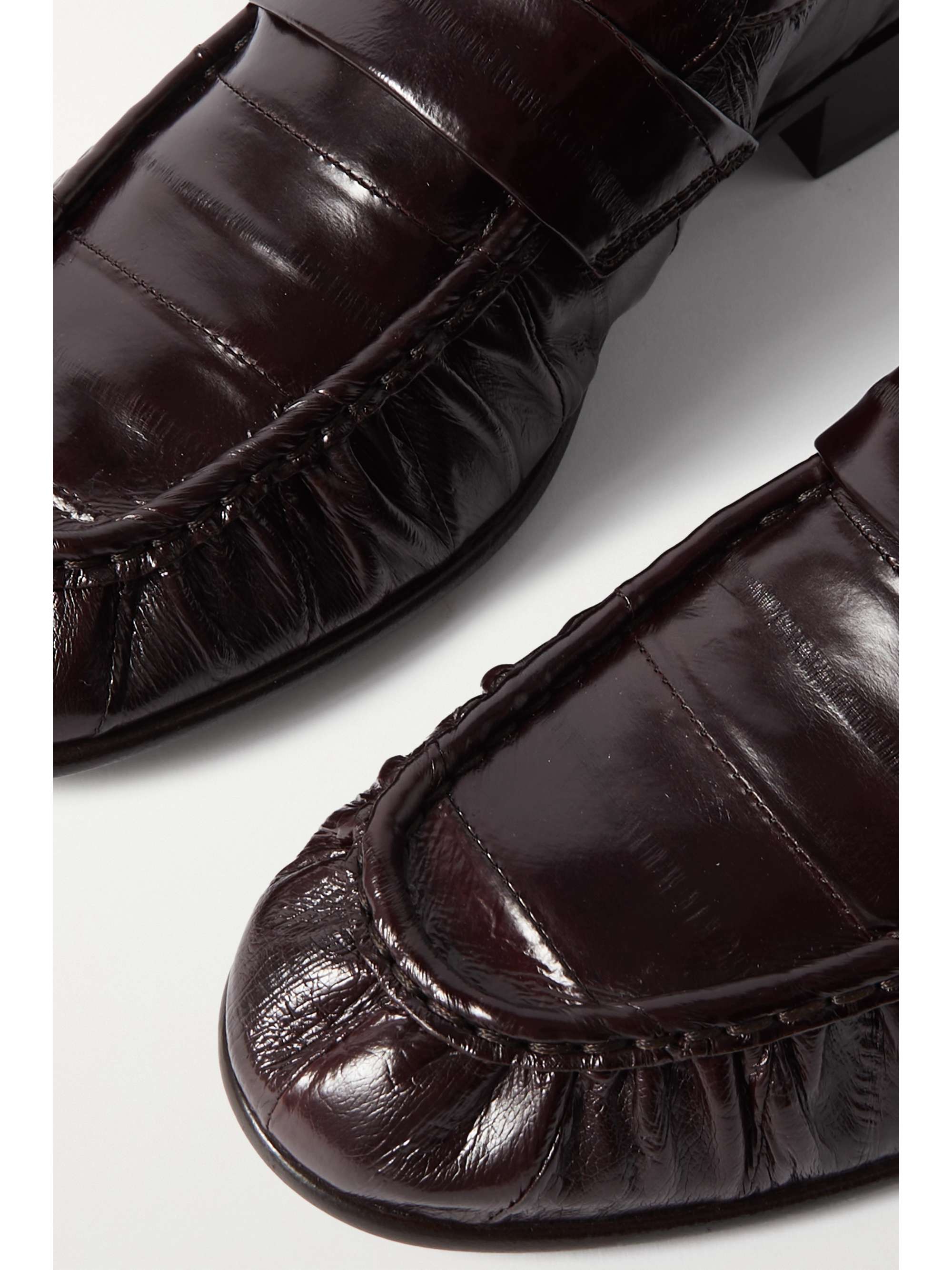 THE ROW Crinkled glossed-leather loafers