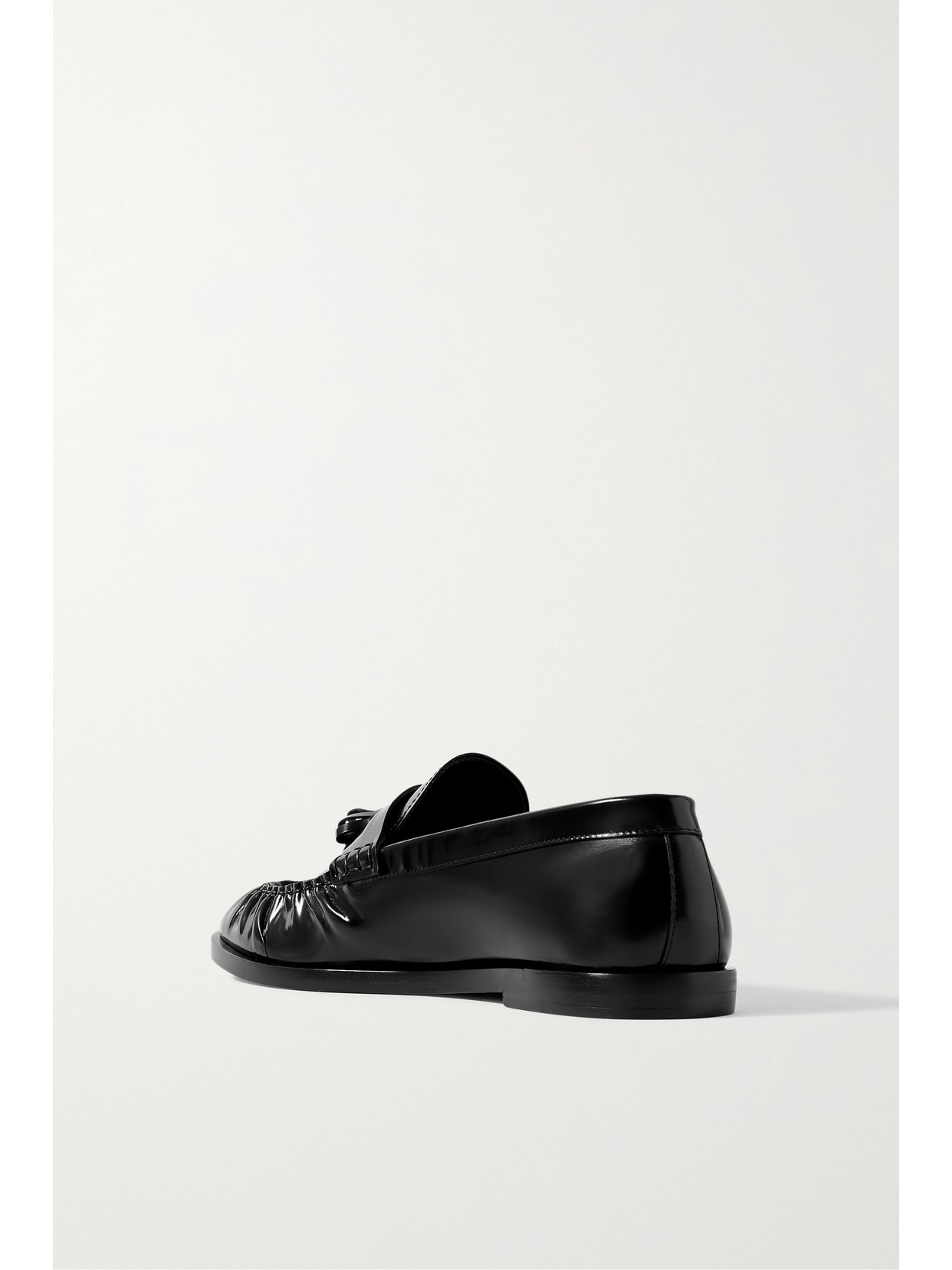 The Row Tasseled Leather Loafers In Black