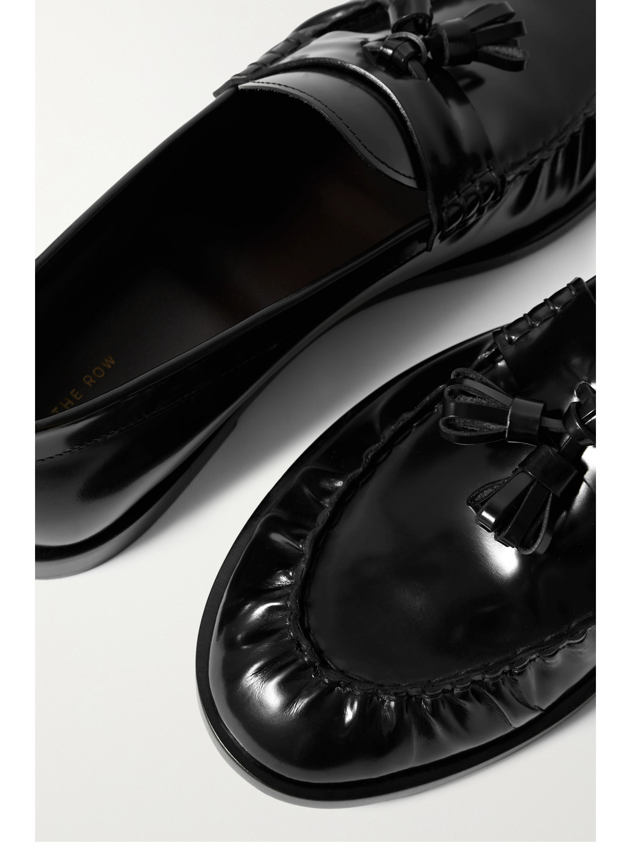 The Row Tasseled Leather Loafers In Black