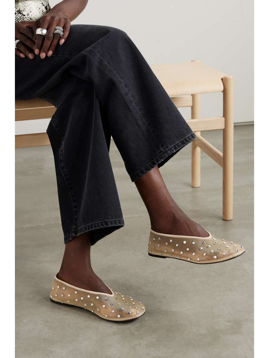 Khaite updates its signature 'Marcy' ballet flats with sparkling crystals, giving them a glamorous feel. They've been made in Italy from sheer mesh and have high-cut vamps and rounded toes.