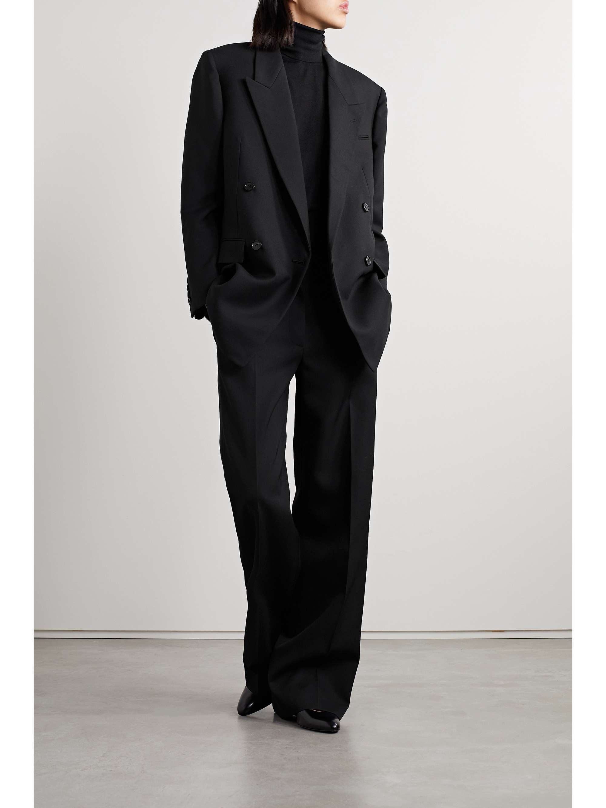 The Row: Black Woolworth Leggings | SSENSE