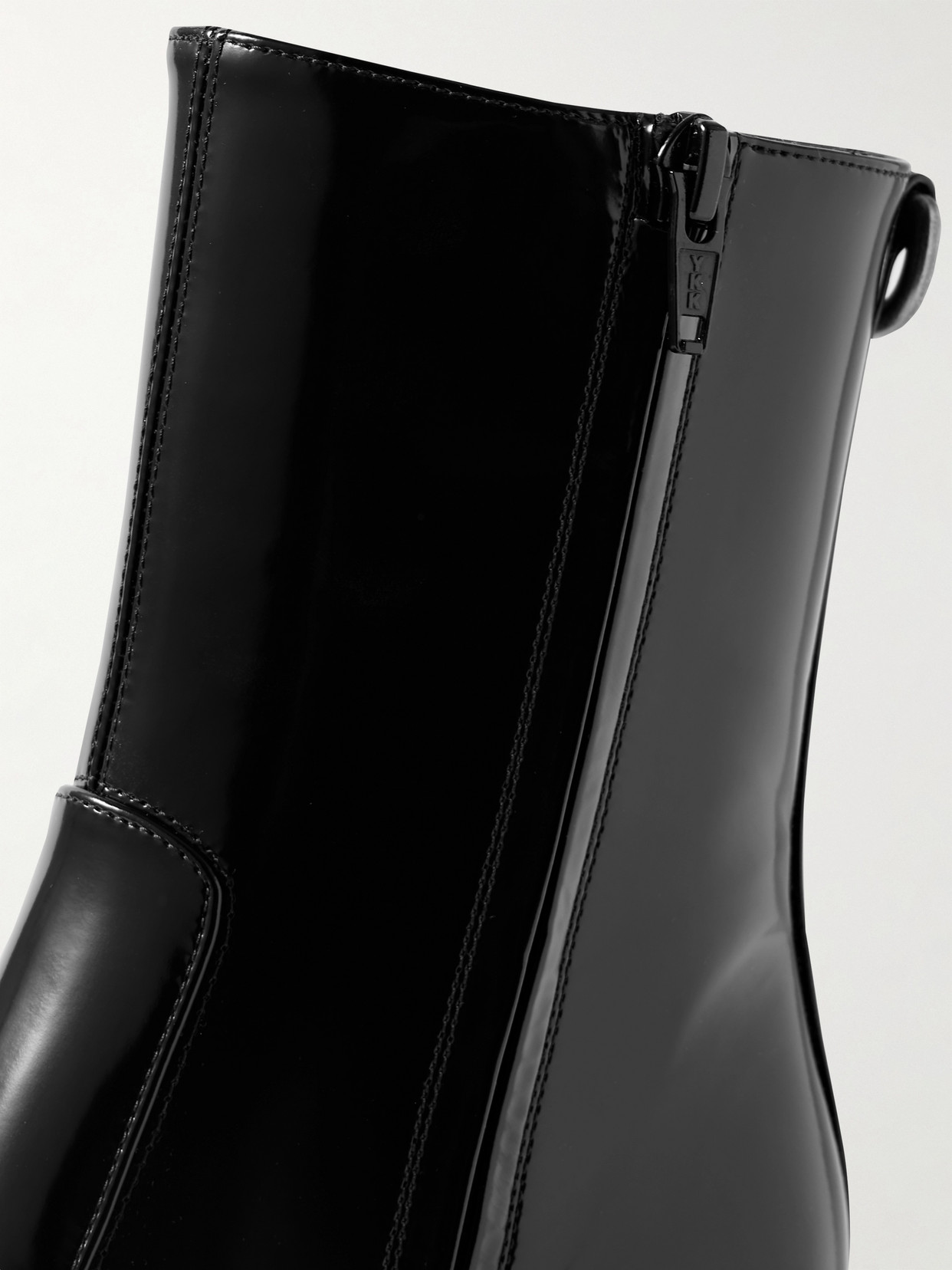 Shop Saint Laurent Betty Buckled Glossed-leather Knee Boots In Black