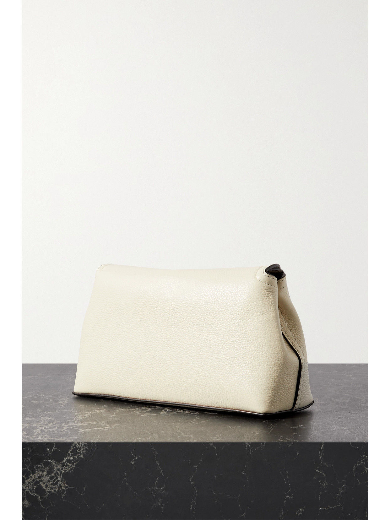 Shop Totême T-lock Textured-leather Clutch In Off-white