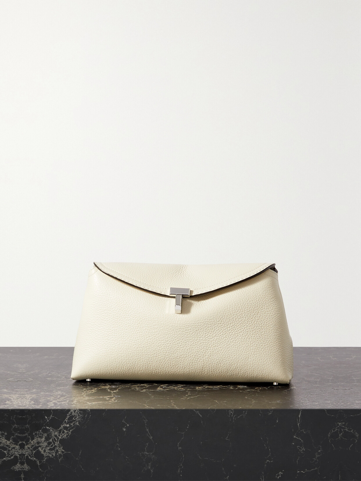 Totême T-lock Textured-leather Clutch In Off-white