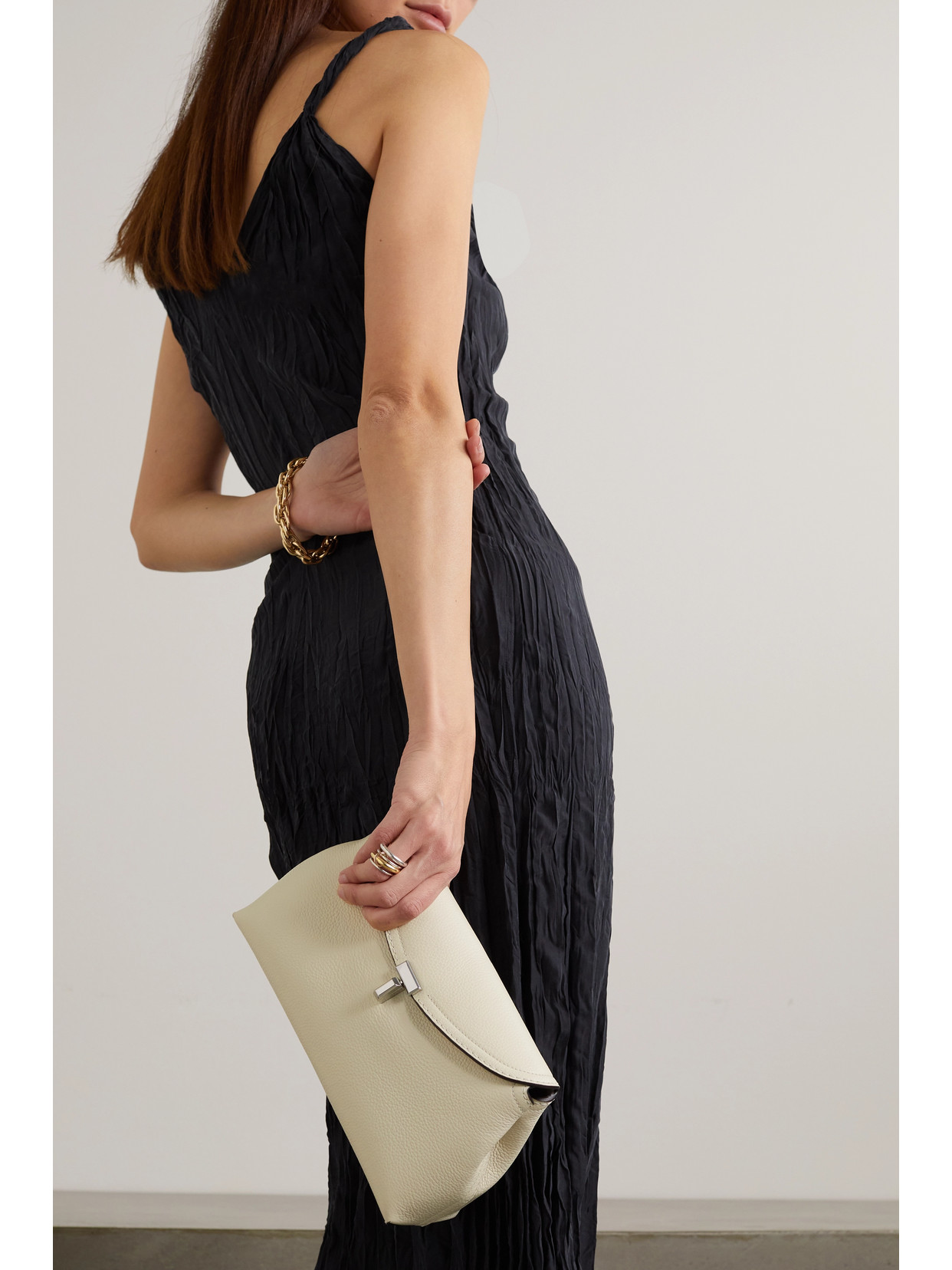 Totême T-lock Textured-leather Clutch In Off-white