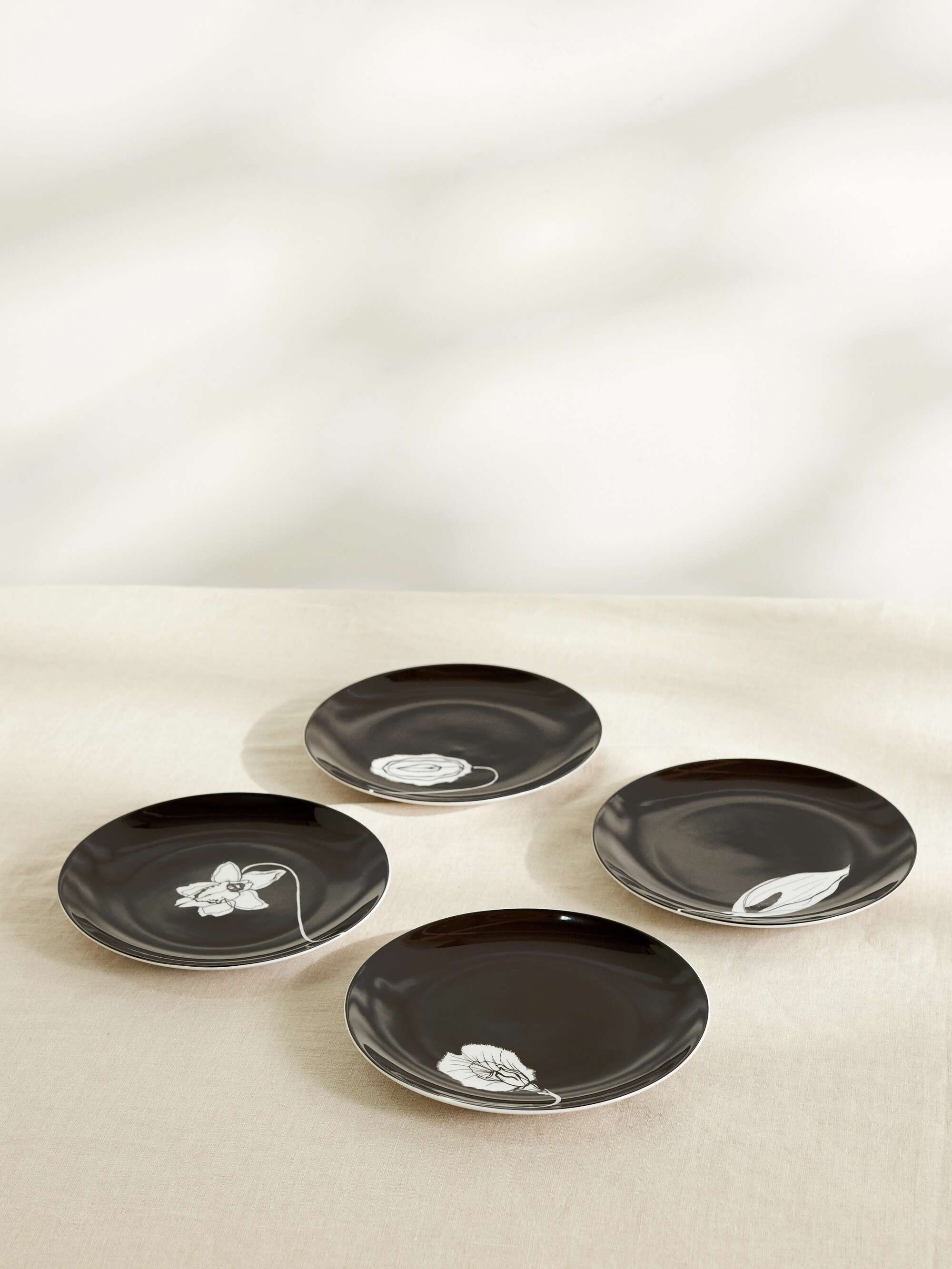 ANISSA KERMICHE Forniplates set of four 21 cm porcelain plates