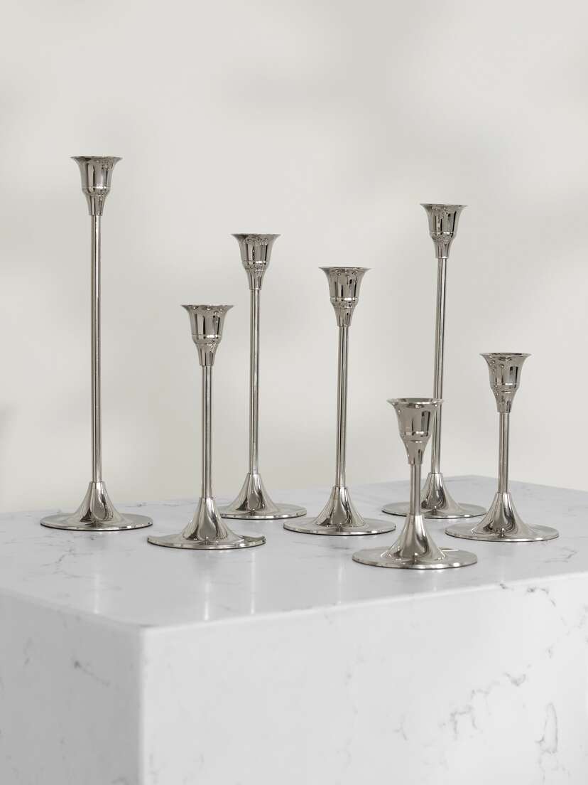 Fourth Street Set Of Seven Nickel Candlesticks