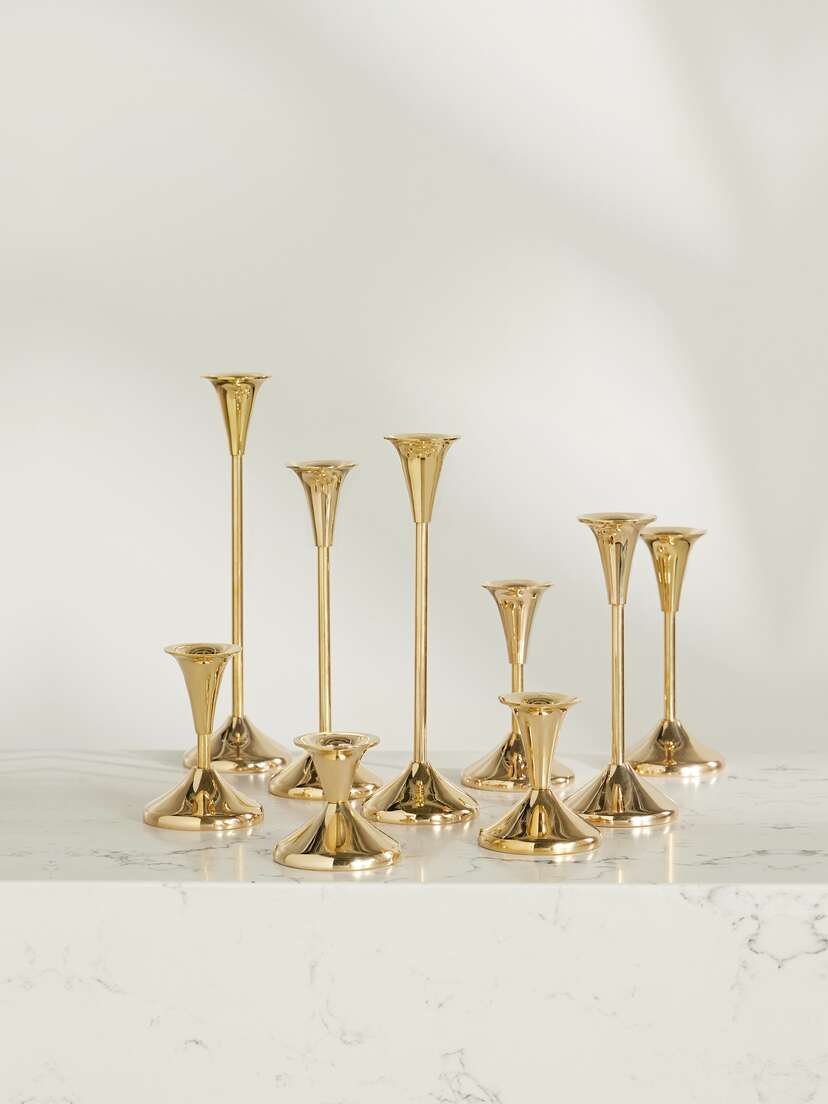Fourth Street Puddle Set Of Nine Brass Candlesticks