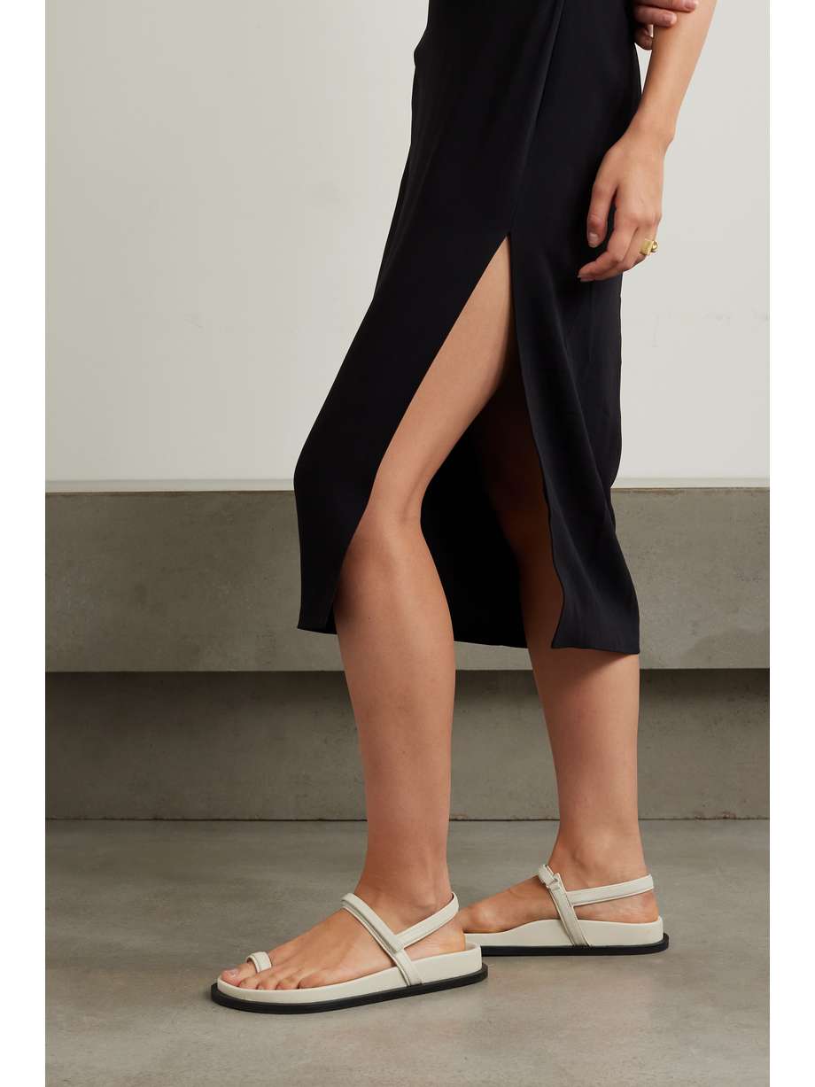 ST. AGNI's shoe collections celebrate minimalism and versatility. These 'Keko' sandals are made from soft cream leather and have VELCRO®-fastening straps. Complement yours with a chrome pedicure.