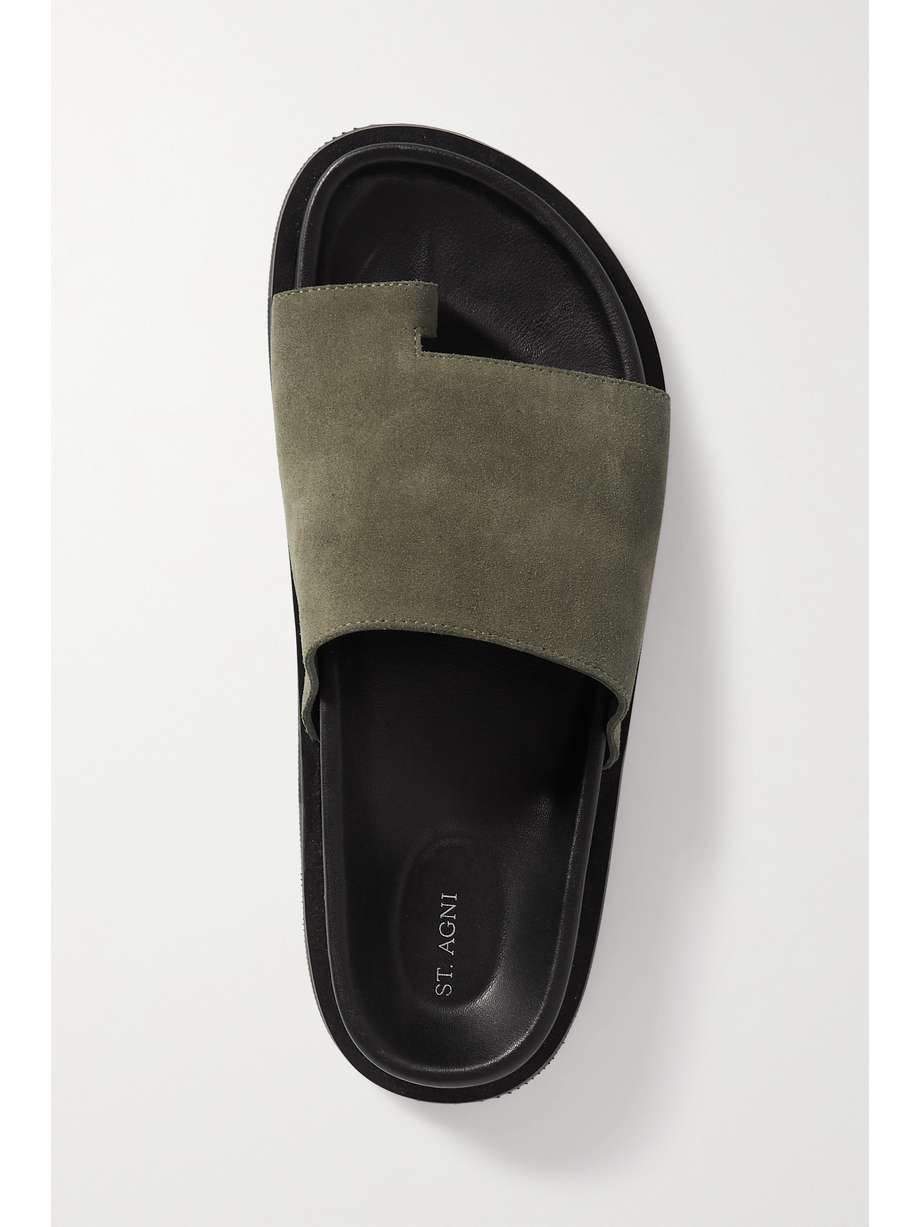 Take ST. AGNI's 'Lou' slides on your next vacation and you'll be surprised how well they'll go with all your outfits. They're made from smooth suede and have wide suede straps.