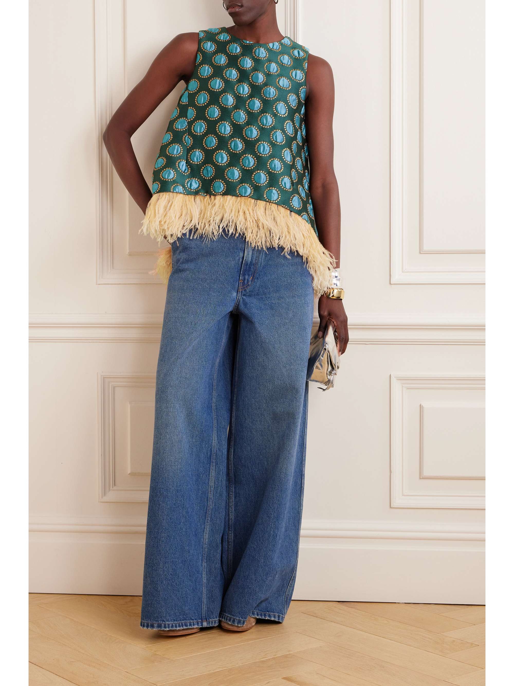 La DoubleJ's signature patterns are designed and fabricated in Lake Como, Italy. Jacquard-woven in the label's "Winter Sun" design, this 'La Scala' top is shot through with metallic threads and has an asymmetric hem with a wispy feather trim.