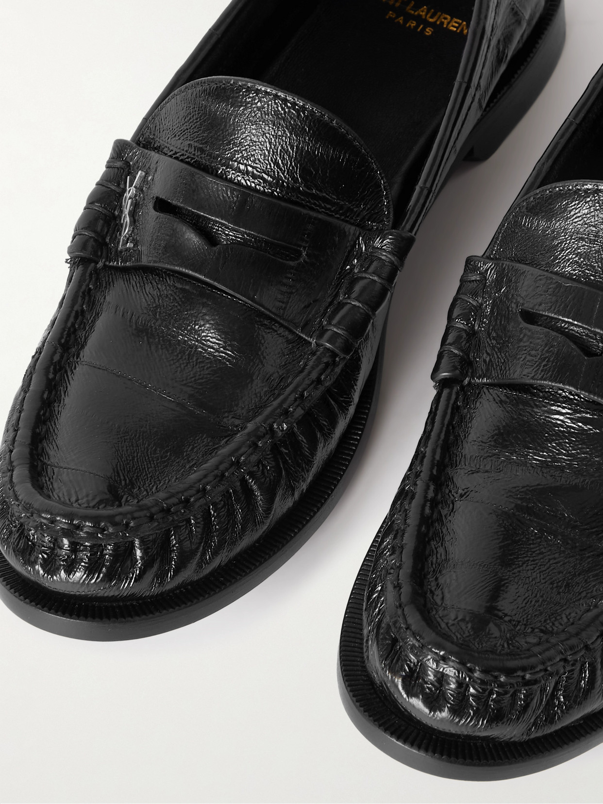 Shop Saint Laurent Logo-embellished Glossed Textured-leather Penny Loafers In Black