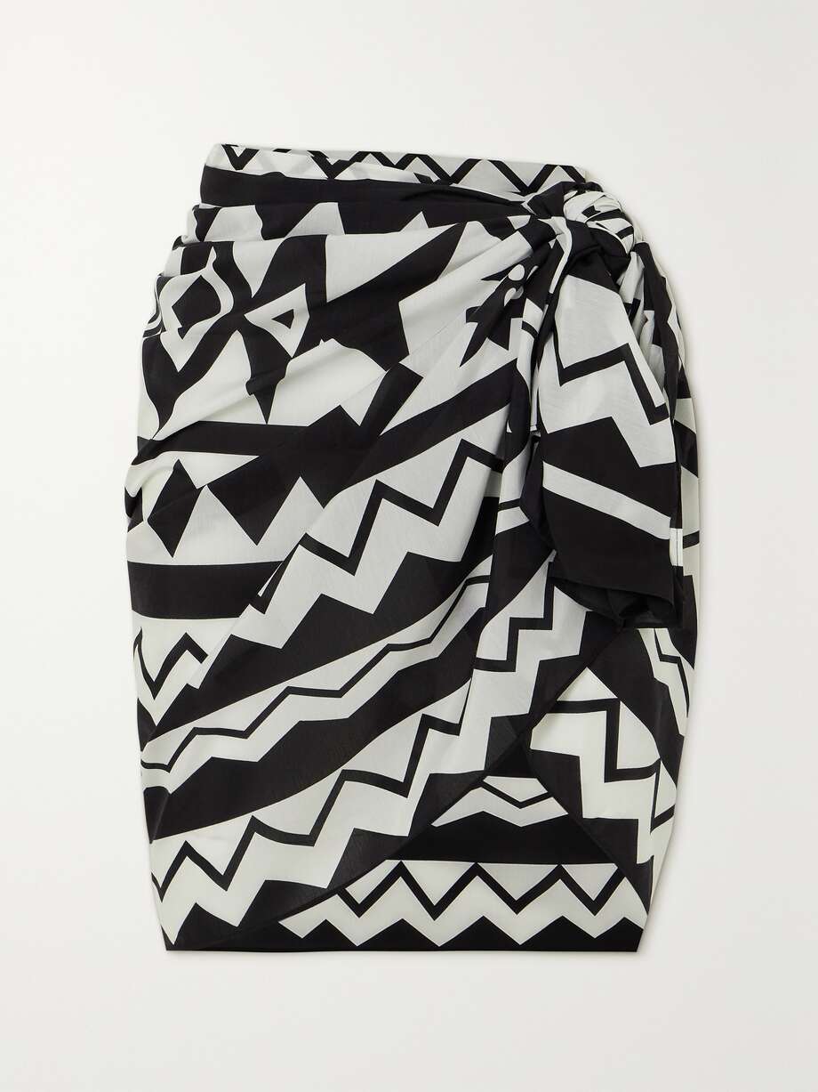 An essential for any tropical vacation, there are multiple ways in which you can style a pareo. Eres' 'Magique' style is cut from smooth cotton and silk-blend and decorated with a striking geometric pattern that matches the bikini in our edit. Fold it in half before knotting it at your waist to make it a mini.
