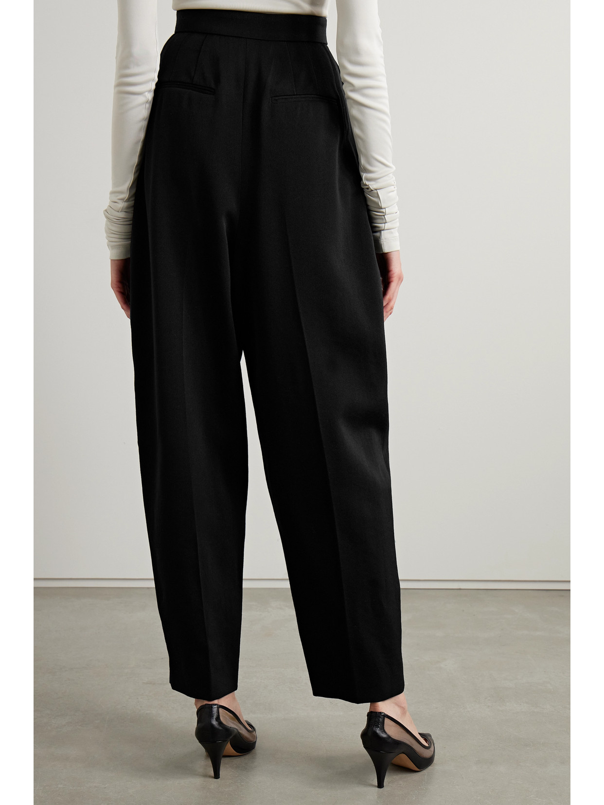 Shop Khaite Ashford Pleated Wool-blend Twill Tapered Pants In Black