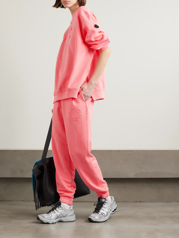 Moncler Embossed cotton-jersey tapered track pants