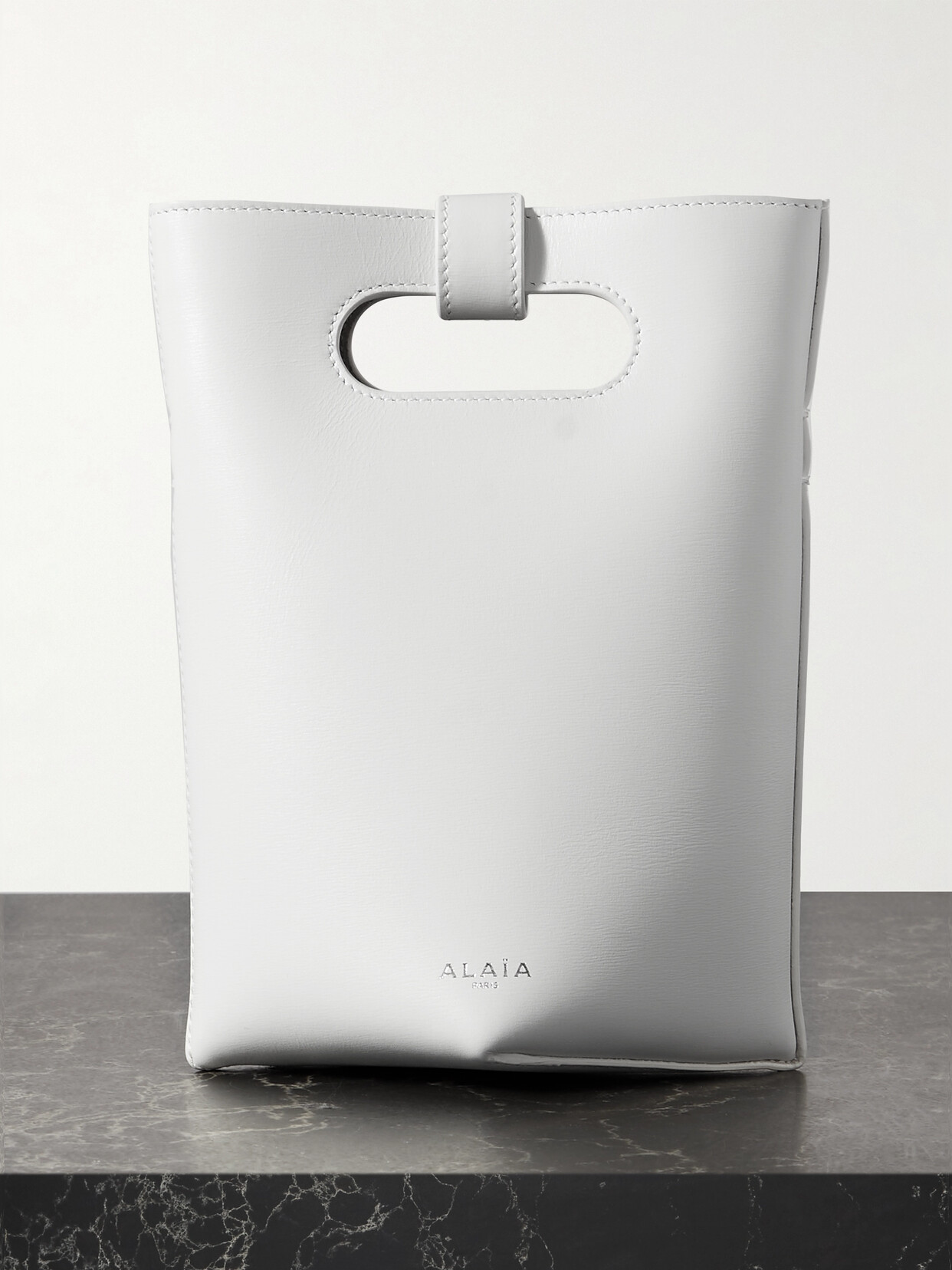 ALAÏA FOLDED SMALL LEATHER TOTE