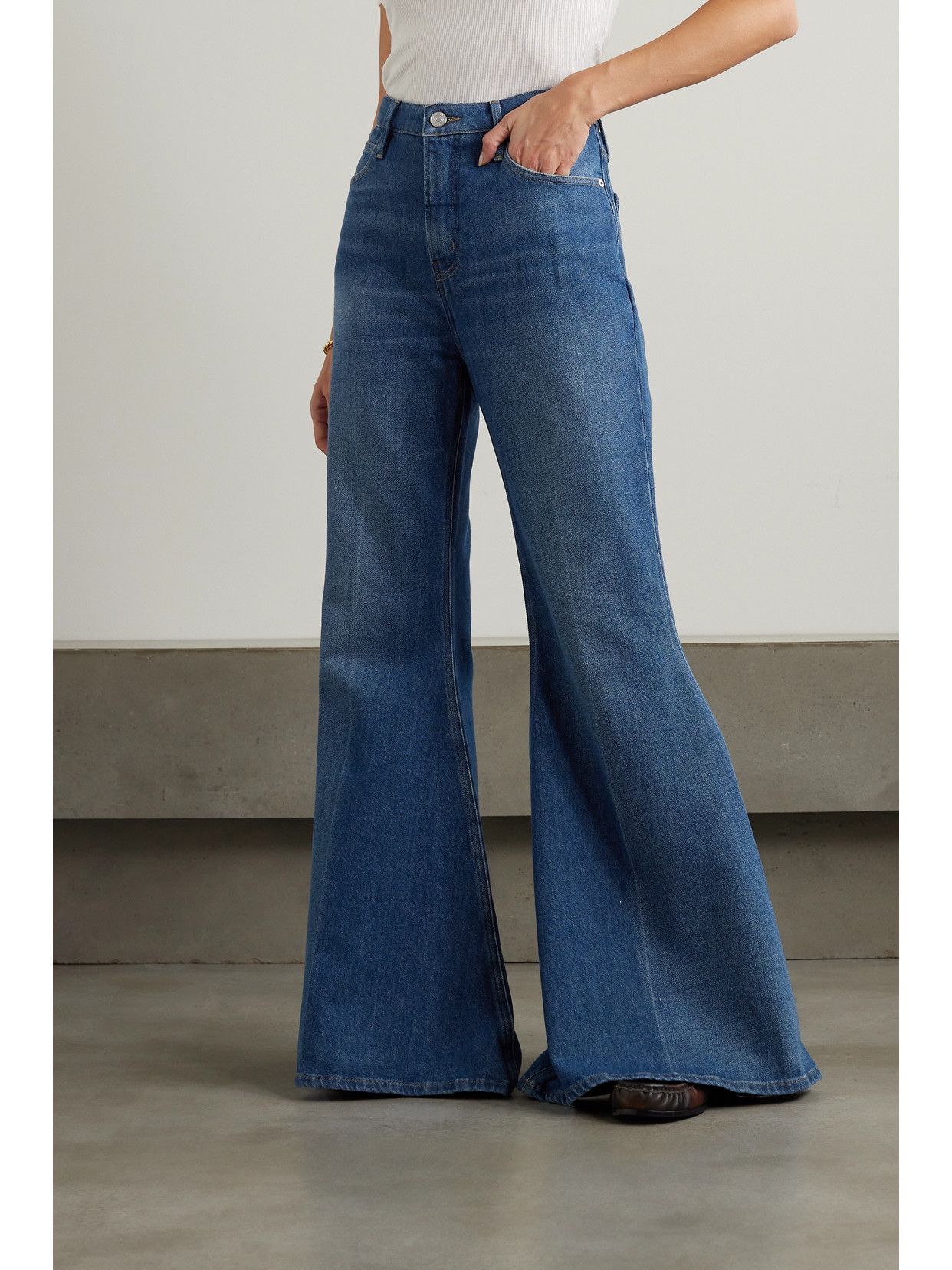 Shop Frame + Net Sustain The Extreme High-rise Flared Jeans In Blue