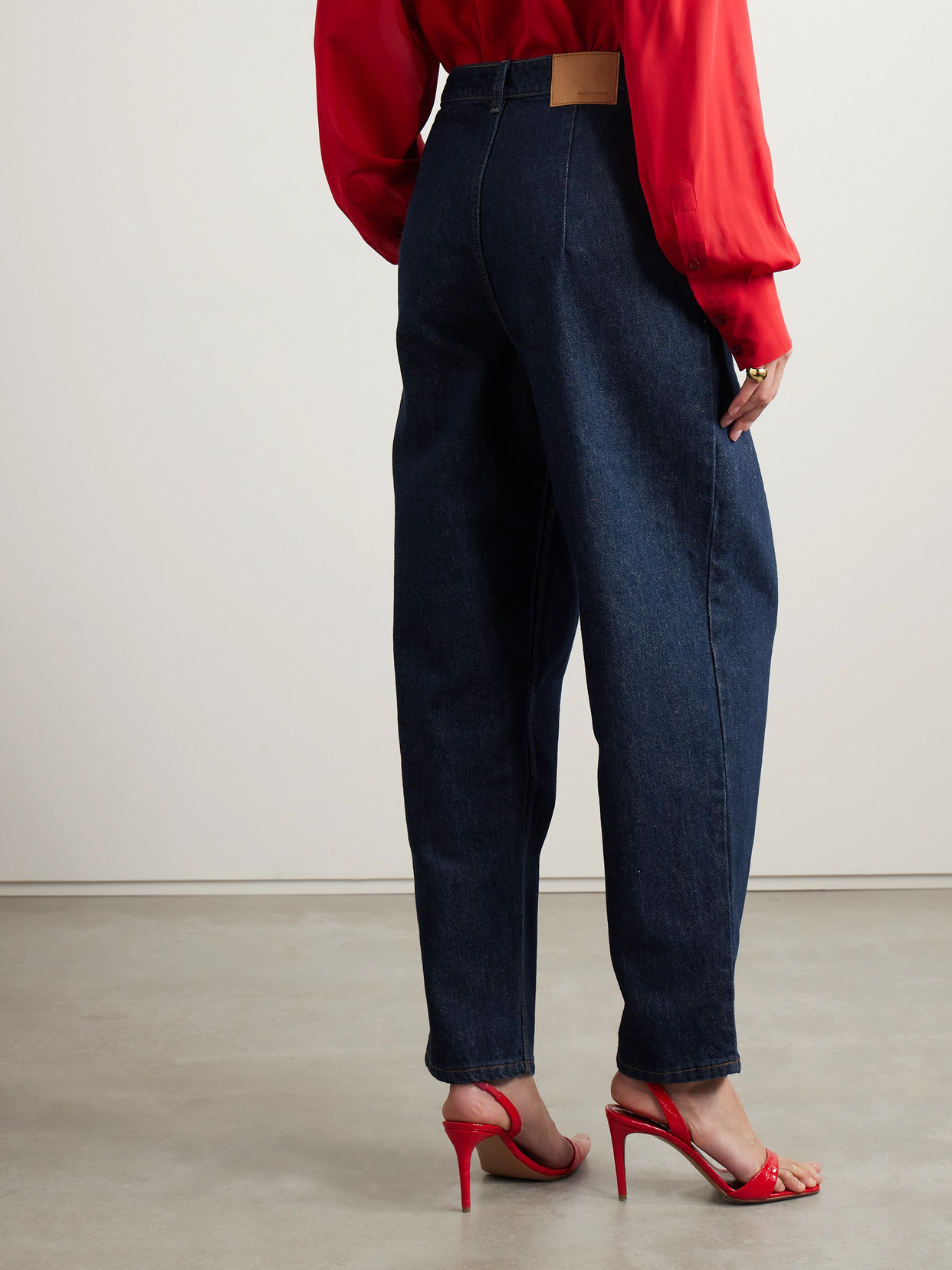 Shop Magda Butrym Toteness Pleated High-rise Tapered Jeans In Blue