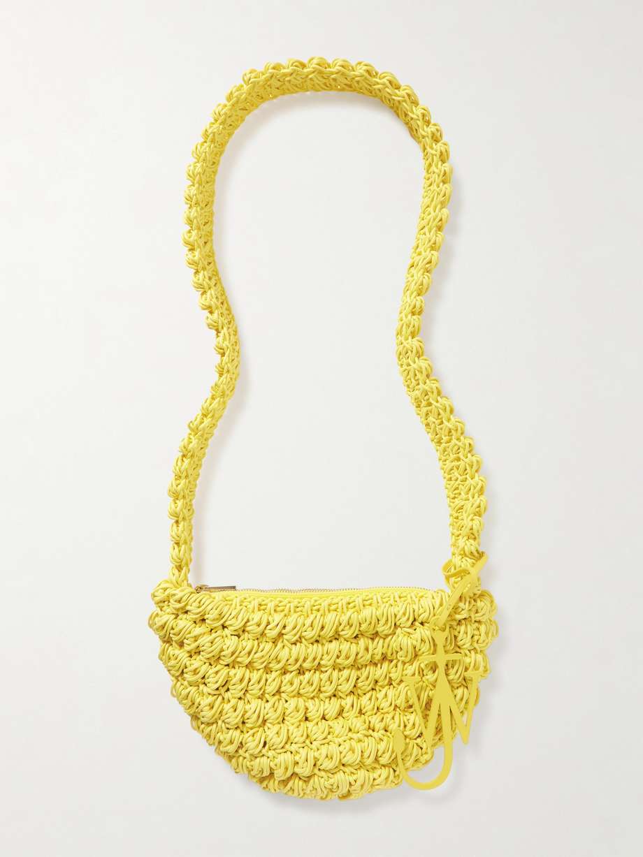 JW Anderson likens the knotty, crocheted texture of this shoulder bag to 'Popcorn'. It's made from cotton in a crescent shape and strung with a leather 'Anchor' motif. Inside, there's enough space for your phone, cardholder and small pack of mints.