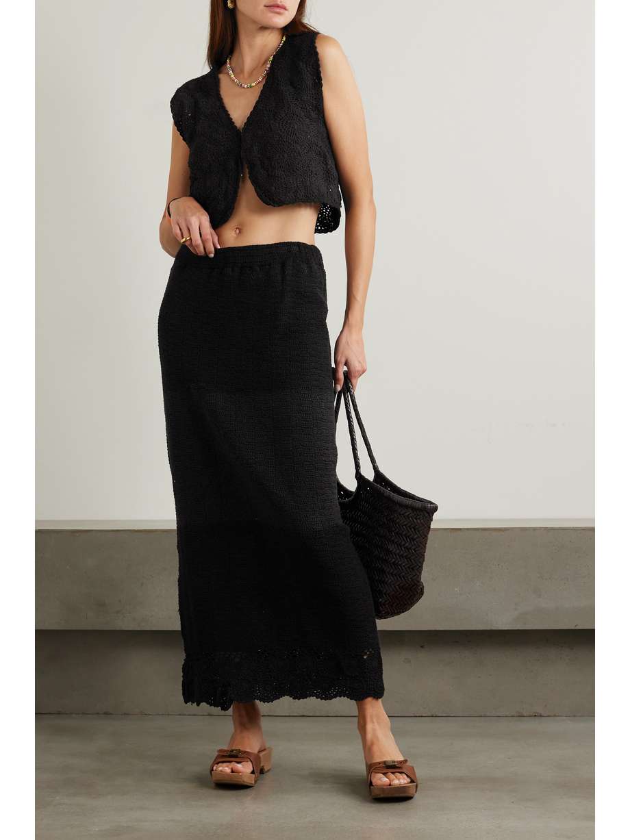 Faithfull The Brand's collections are inspired by fabrics collected from vintage markets around the world. This 'Lula' skirt is crocheted by hand from soft cotton and has a sweetly scalloped hem. You won't regret packing it on your next vacation - it'll pair well with camisoles, shirts or bikinis.