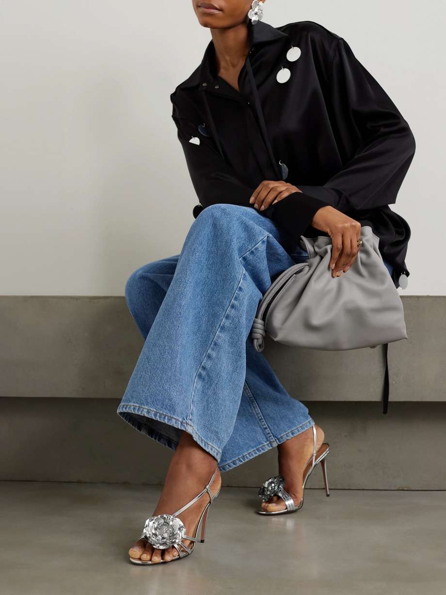 Aquazzura's 'Paris Rose 105' sandals are true maximalist elegance. They're crafted from silver leather in a strappy silhouette and detailed with a crystal-embellished rose at the front.