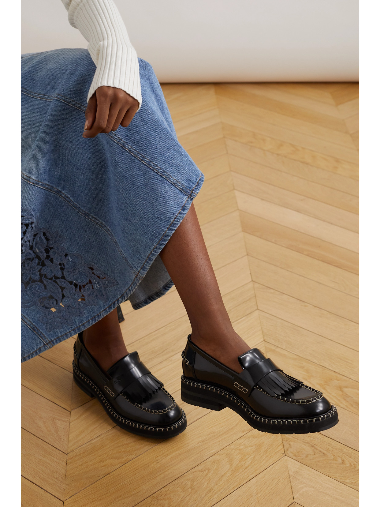 Shop Chloé Noua Fringed Whipstitched Leather Loafers In Black