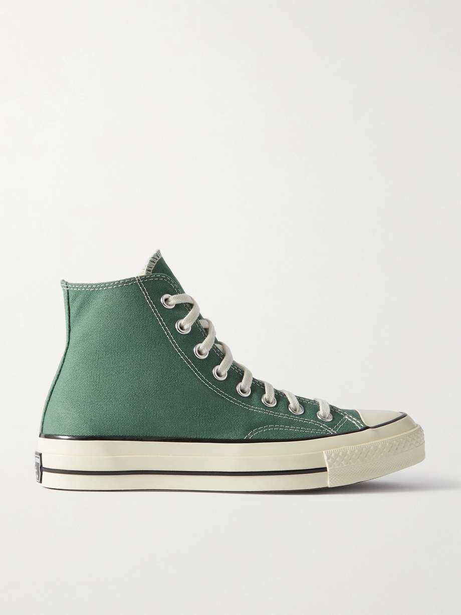 Converse's 'Chuck 70' sneakers have the same iconic high-top shape that’s synonymous with the label, but are updated with a more durable canvas upper and cushioned insole for comfort. This green pair is finished with contrasting stitching and a vintage 'license plate' plaque at the heel. Wear them with jeans and dresses alike.
