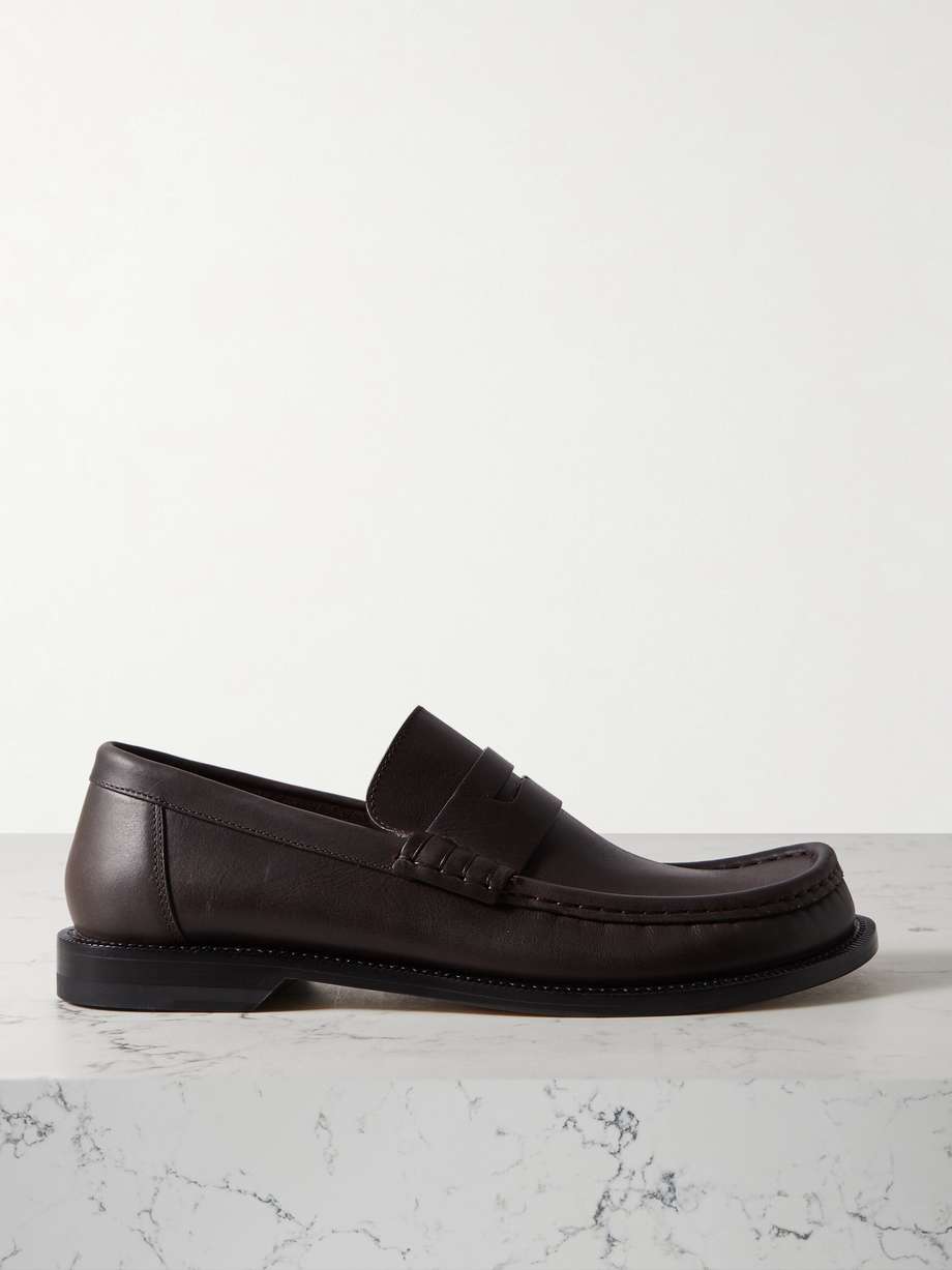 spring 2024 shoe trends  - If you're trying to inject a little more fun into your wardrobe, Loewe's shoe collections won't let you down. These 'Campo' loafers are crafted from supple leather with an elongated, asymmetric toe and classic penny slots.