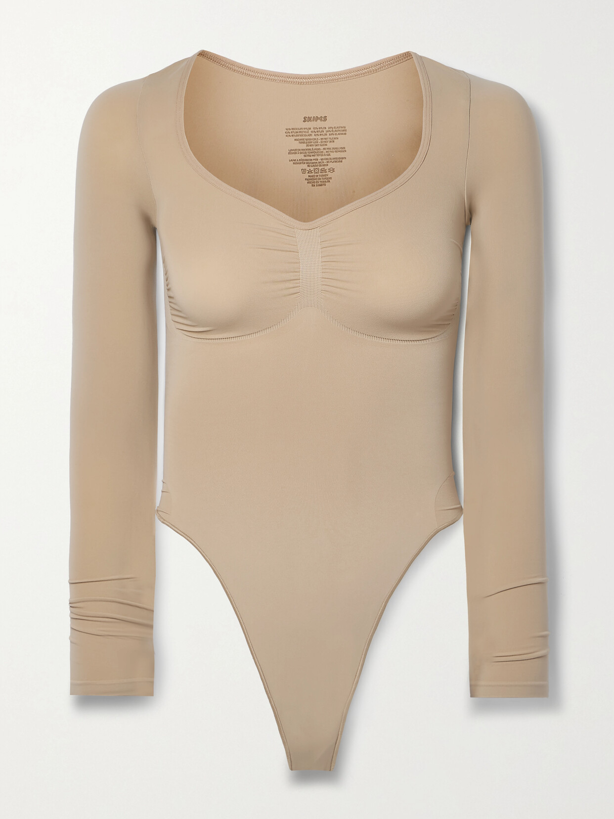 Shop Skims Seamless Sculpt Long Sleeve Thong Bodysuit In Neutrals