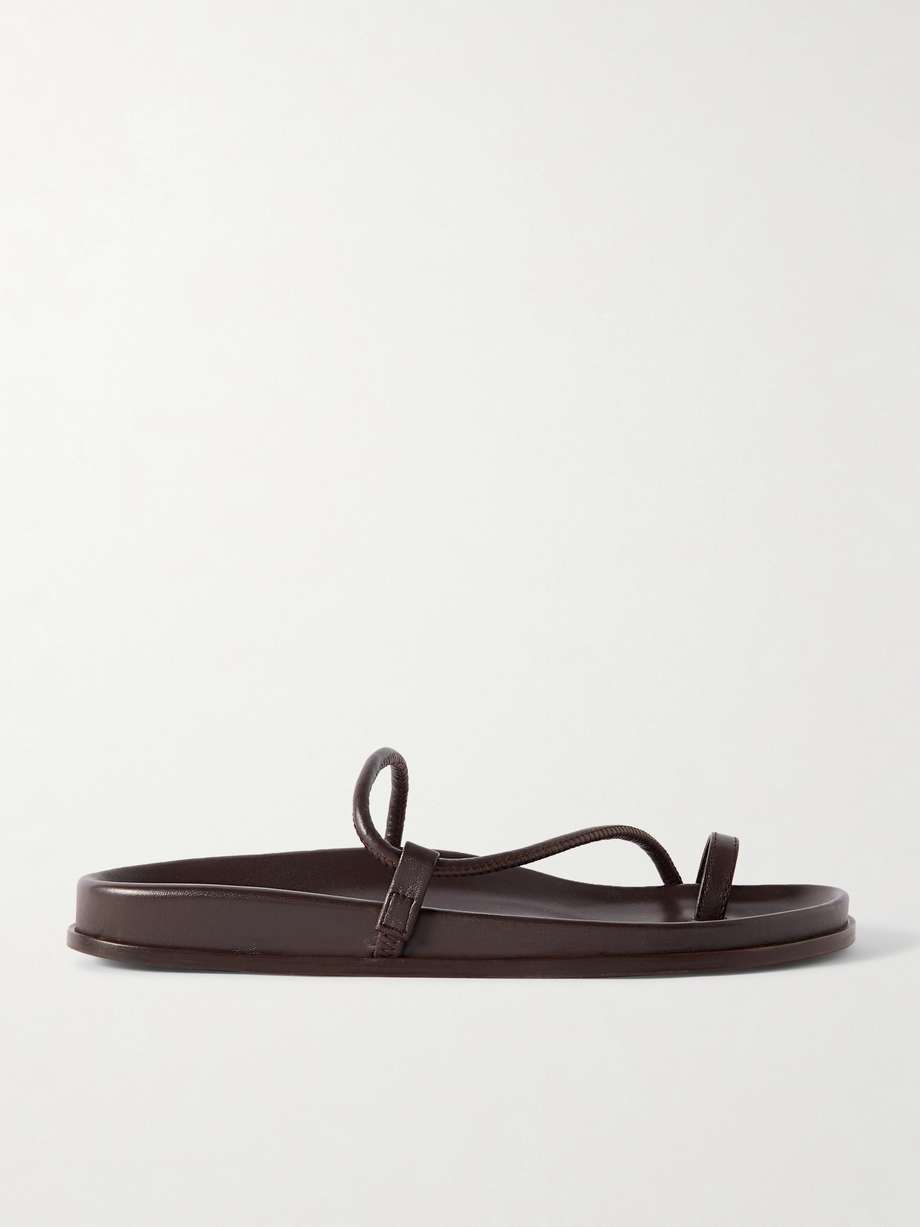 Emme Parsons' 'Bari' sandals are meticulously crafted in Italy from smooth 'Espresso' leather. Boasting a clean, sleek design, they rest on molded footbeds and have slim straps that frame your foot. Style yours with everything from relaxed tailoring to summer dresses.