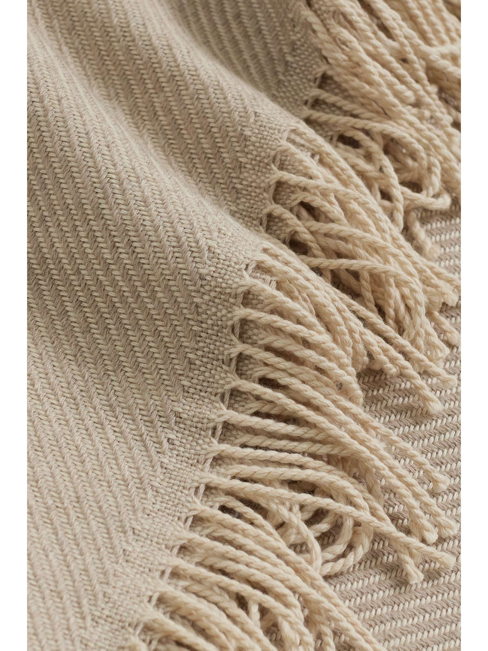 Lofty fringed merino wool-twill throw