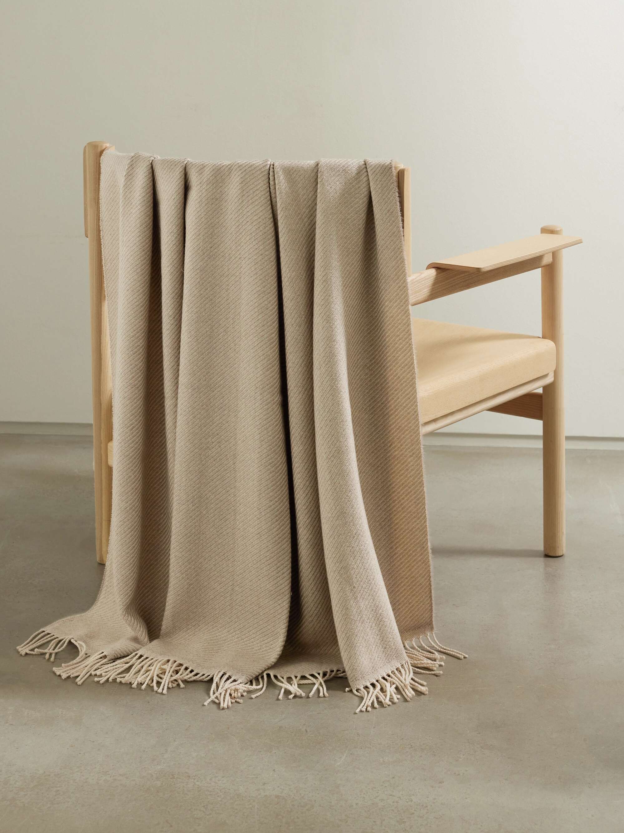 Lofty fringed merino wool-twill throw