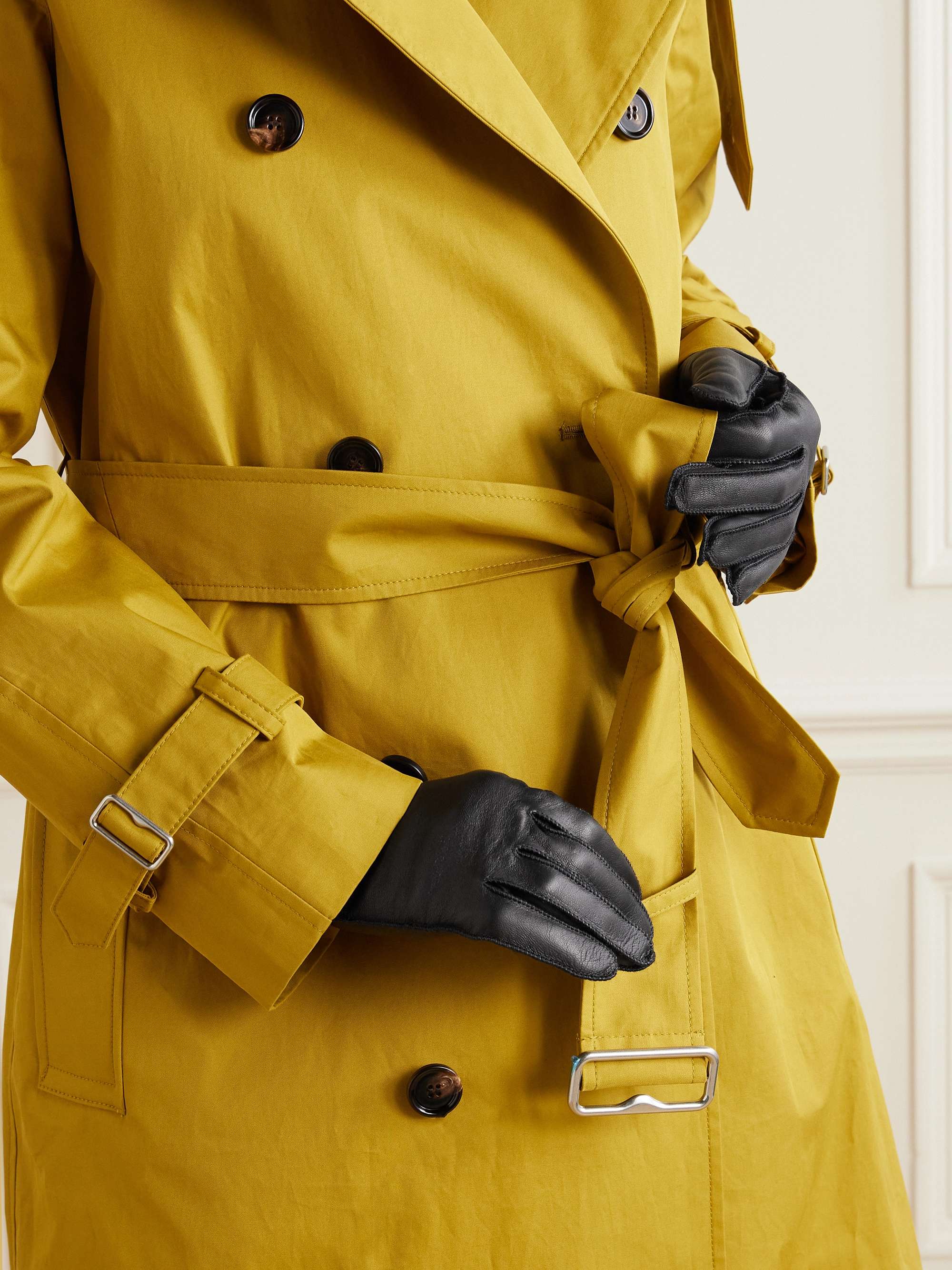 BURBERRY Debossed leather gloves NET A PORTER