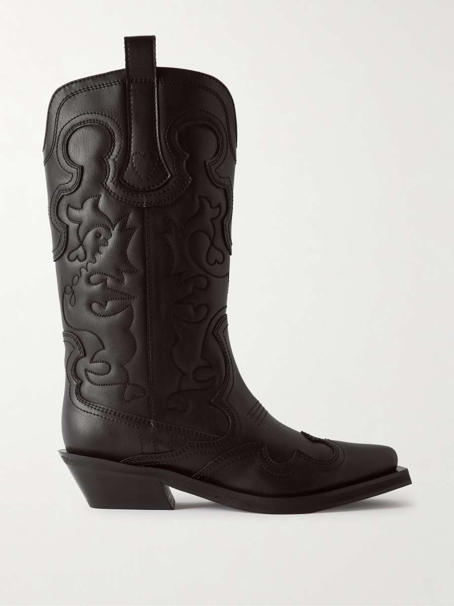 GANNI's signature cowboy boots have long been a hallmark of the Scandi brand. This pair has been crafted in Portugal from leather with swirling topstitching and rest on a stacked Cuban heel