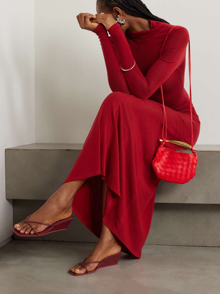 ST. AGNI's sandals will go with so many outfits. Nodding to '90s minimalism, they're made from leather with slim straps and soft toe posts. The squared-off wedge heel has a modern, artful feel.