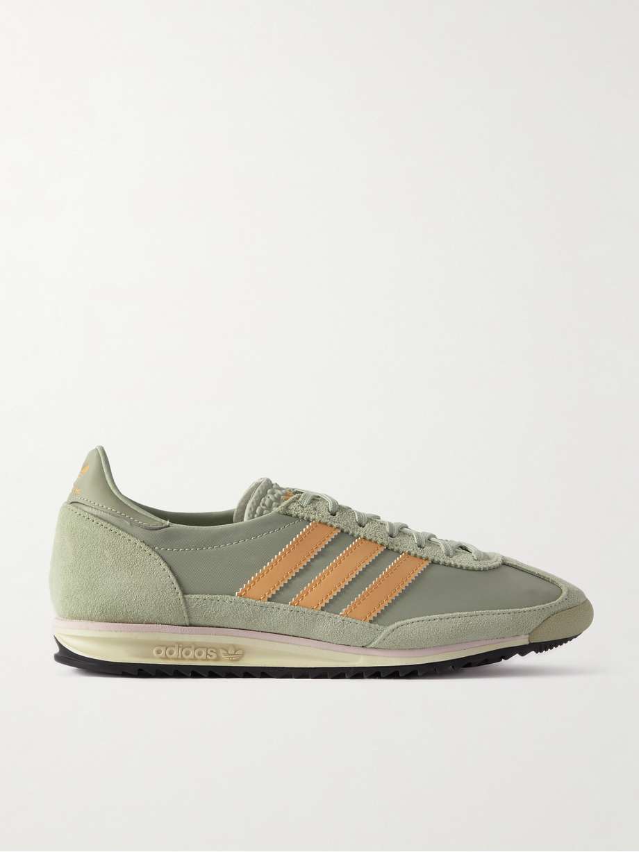 sl72 trend - adidas Originals' iconic 'SL 72' sneakers get their name from the 'Super Light' construction and their debut at the Summer Olympics in 1972. Made from nylon and suede, this version has a slim, low shape trimmed with leather, including the signature ‘3-Stripes’ at the side. The serrated soles offer traction on the track and city streets.
