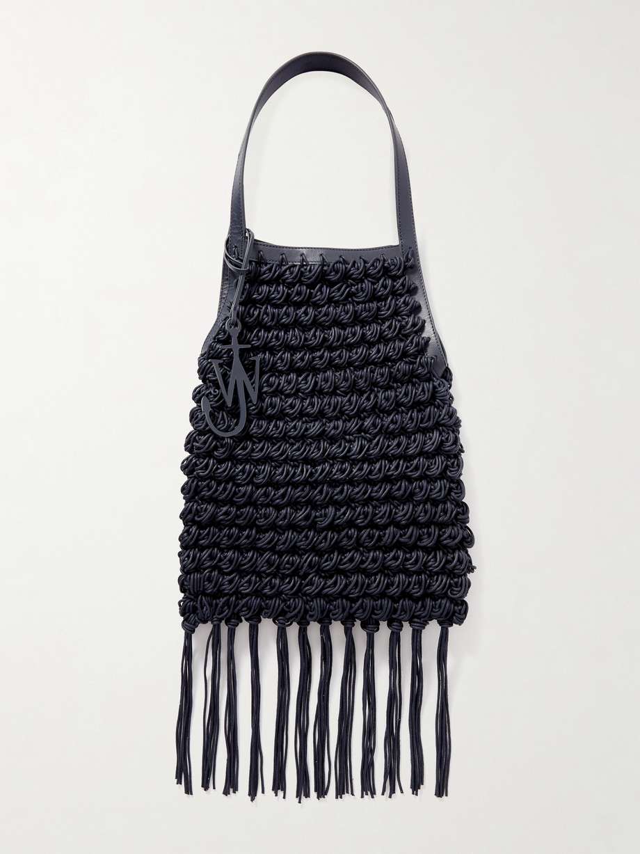 JW Anderson's 'Popcorn Shopper' tote is crocheted from waxed-cotton to replicate the texture of everyone's favourite cinema snack. It's trimmed with swishy fringing and has leather straps accented with the label's signature 'Anchor' keyring. Inside, there's enough space for your phone, sunglasses and keys.