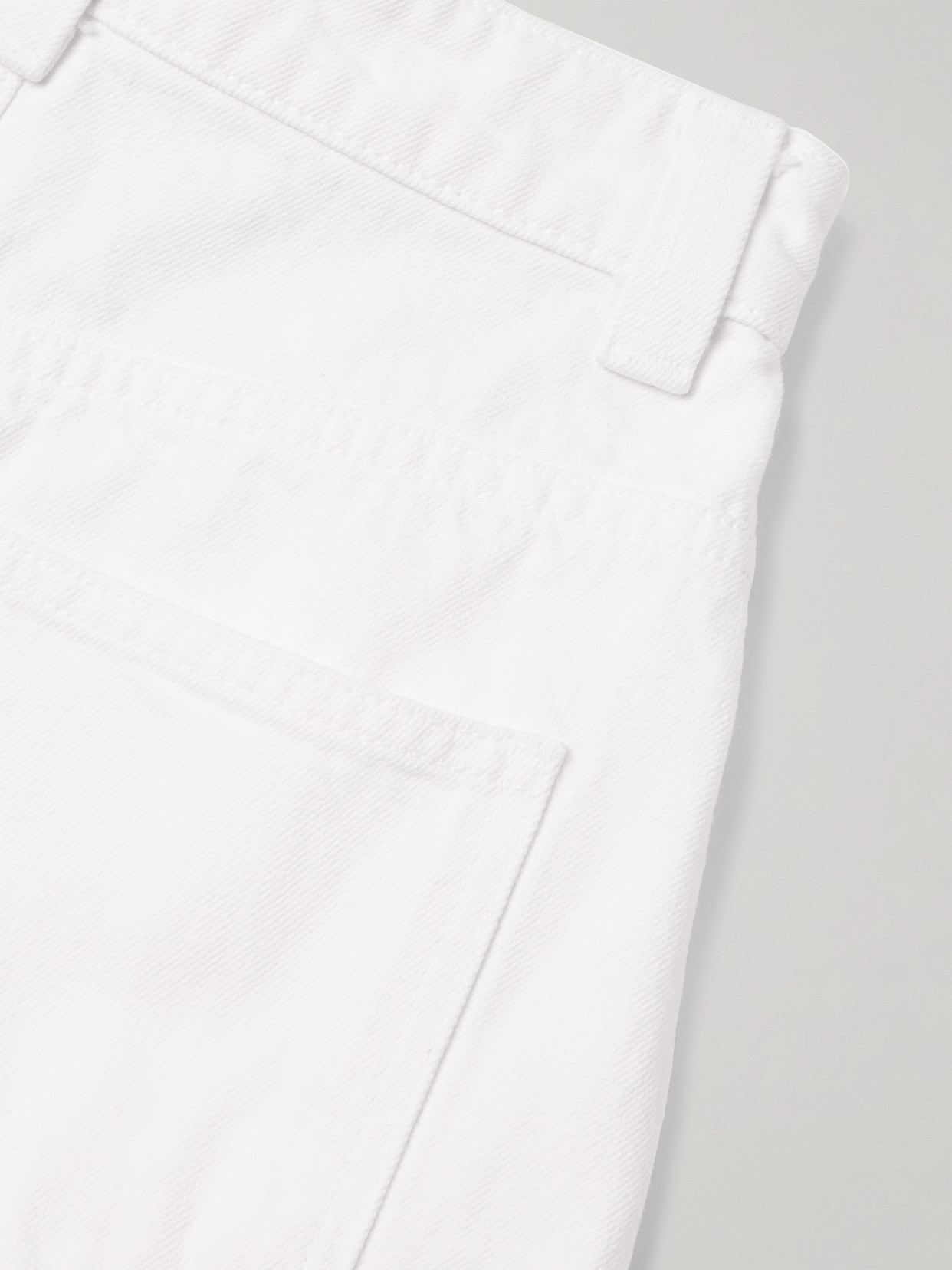 Khaite Ashford Pleated High-rise Tapered Jeans In White