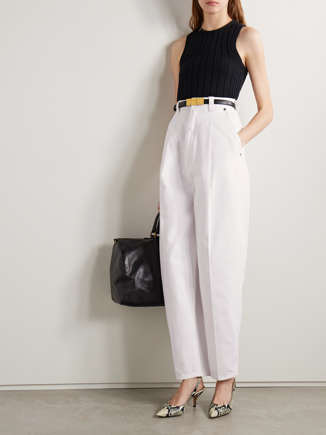 Khaite Ashford Pleated High-rise Tapered Jeans In White