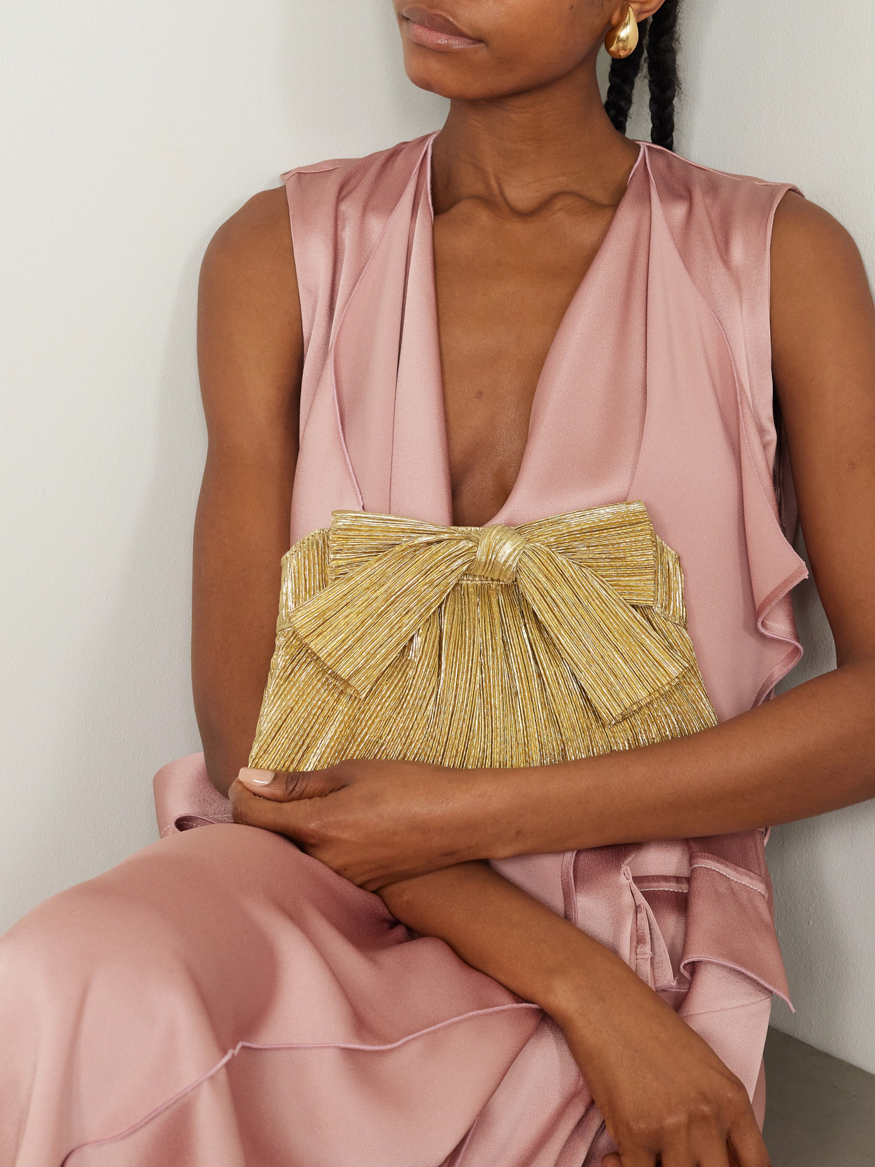 Shop Loeffler Randall Rayne Bow-embellished Plissé-lamé Clutch In Gold