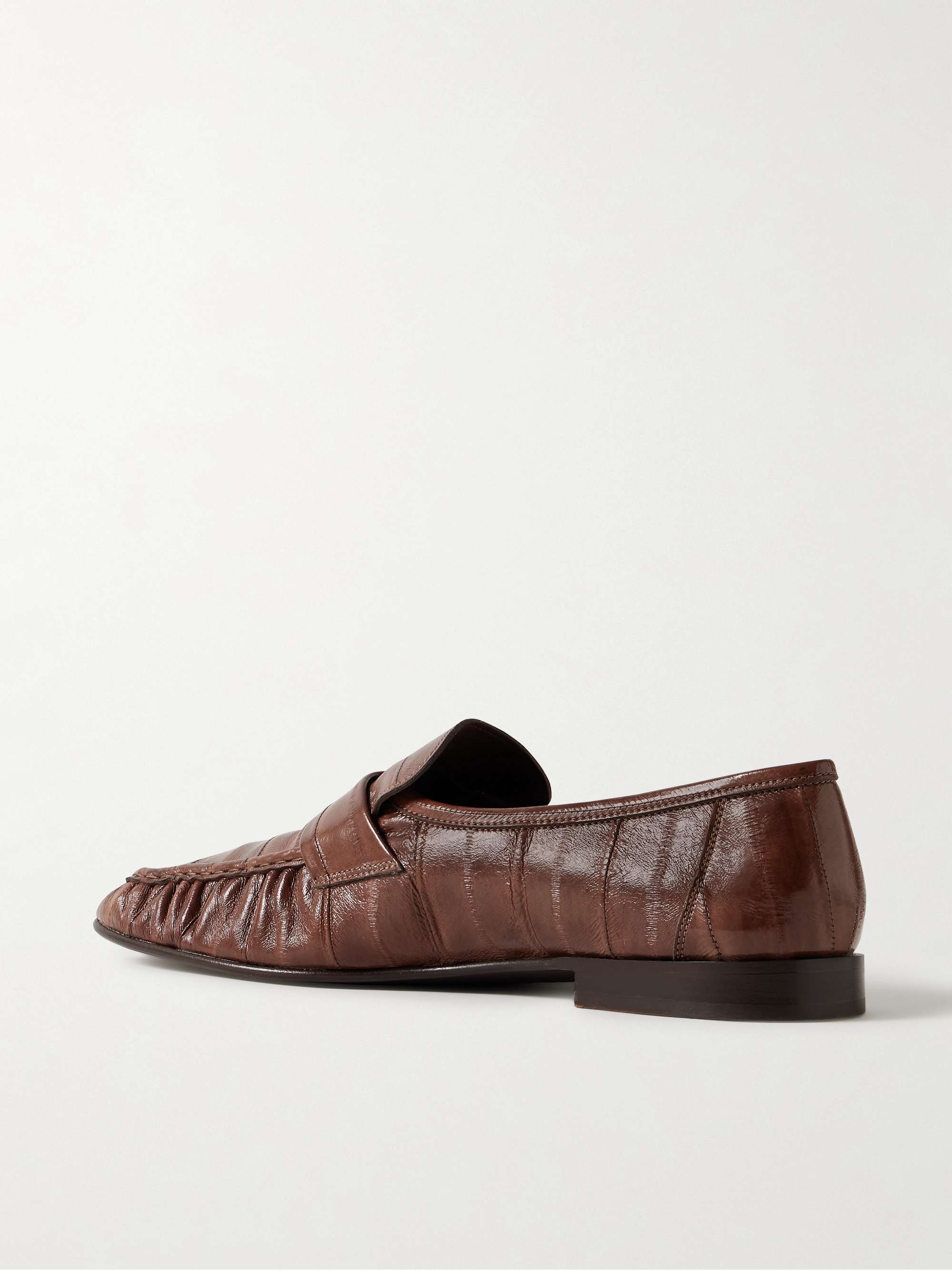 THE ROW Crinkled glossed-leather loafers