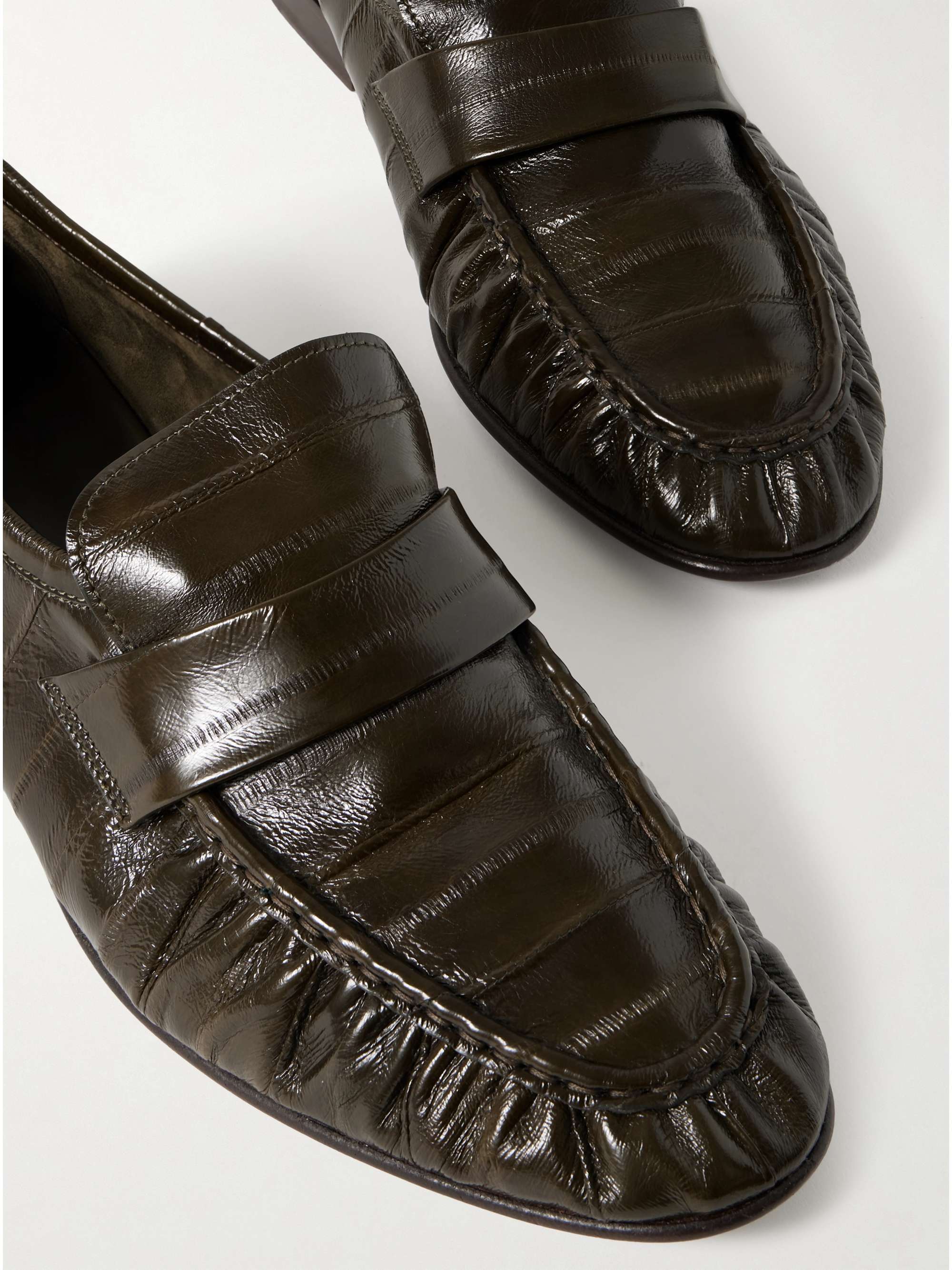 THE ROW Crinkled glossed-leather loafers