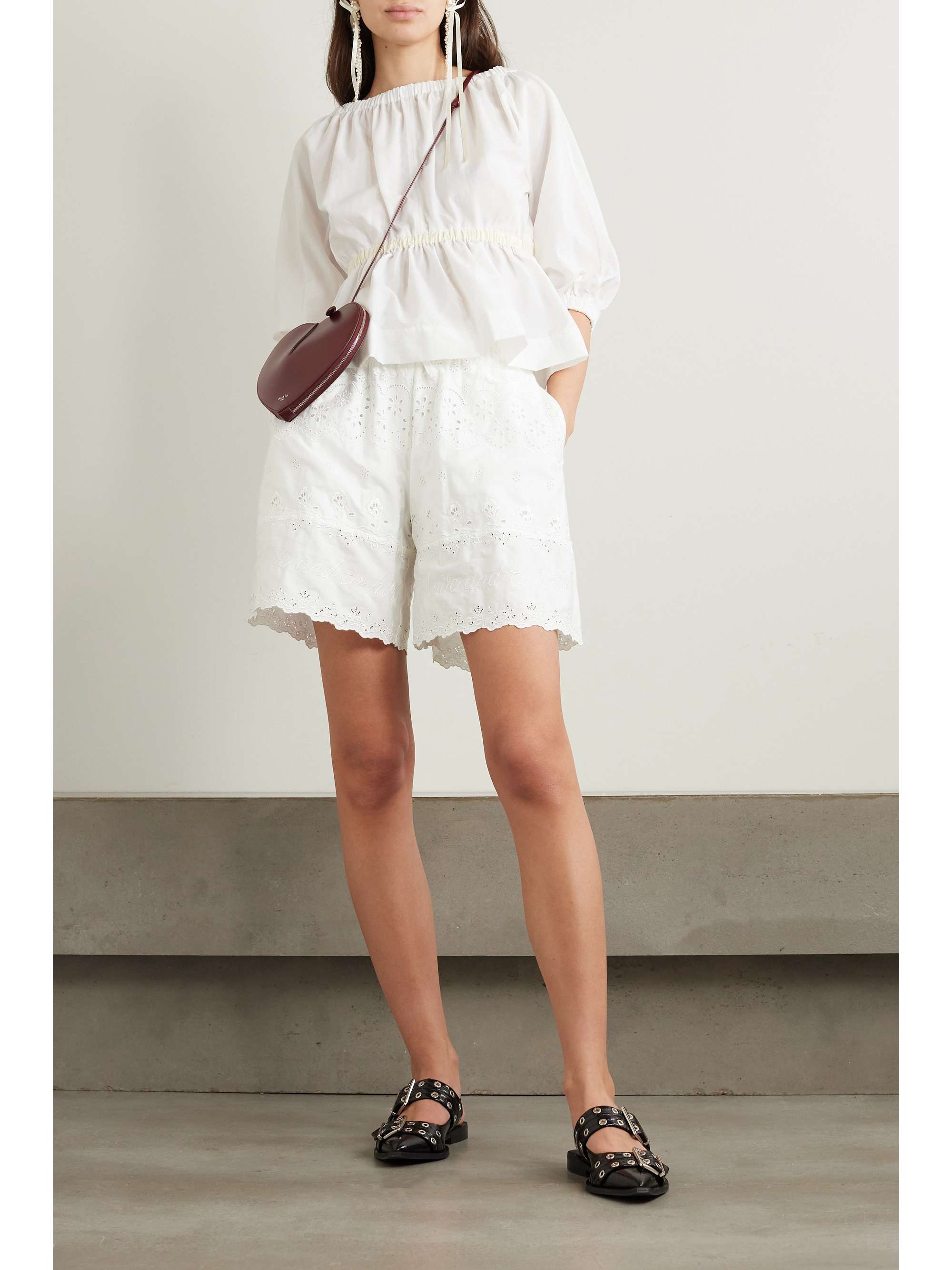 Bridalwear doesn't have to be overly feminine or girly - Simone Rocha's shorts are embroidered with 'to have and to hold' along the hems. Cut from cotton-poplin, they're detailed with intricate broderie anglaise and comfy drawstrings. They're perfect for your bachelorette or the morning after the night before.
